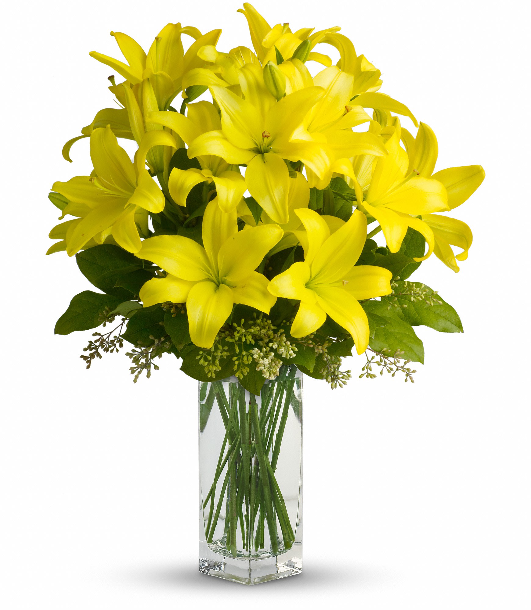 Teleflora's Lily Sunshine - When it comes to spring flowers, the lily reigns supreme. It's easy to see why in this gorgeous bouquet of bright yellow blooms.  