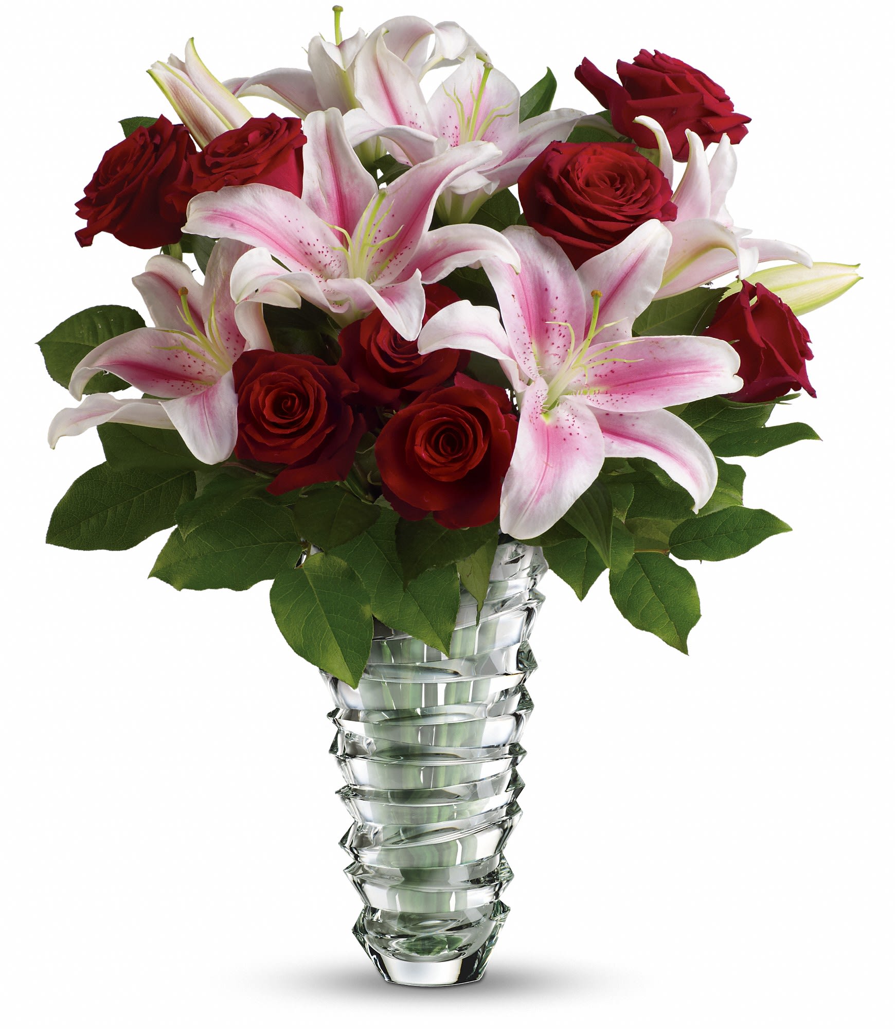 Teleflora's Melt My Heart - Long Stemmed Roses - Does she melt your heart? Let her know with roses and lilies in a dazzling contemporary vase with free-form rings that look like they're melting. She'll get the message. And you'll get a thank-you that will melt your heart as well. 