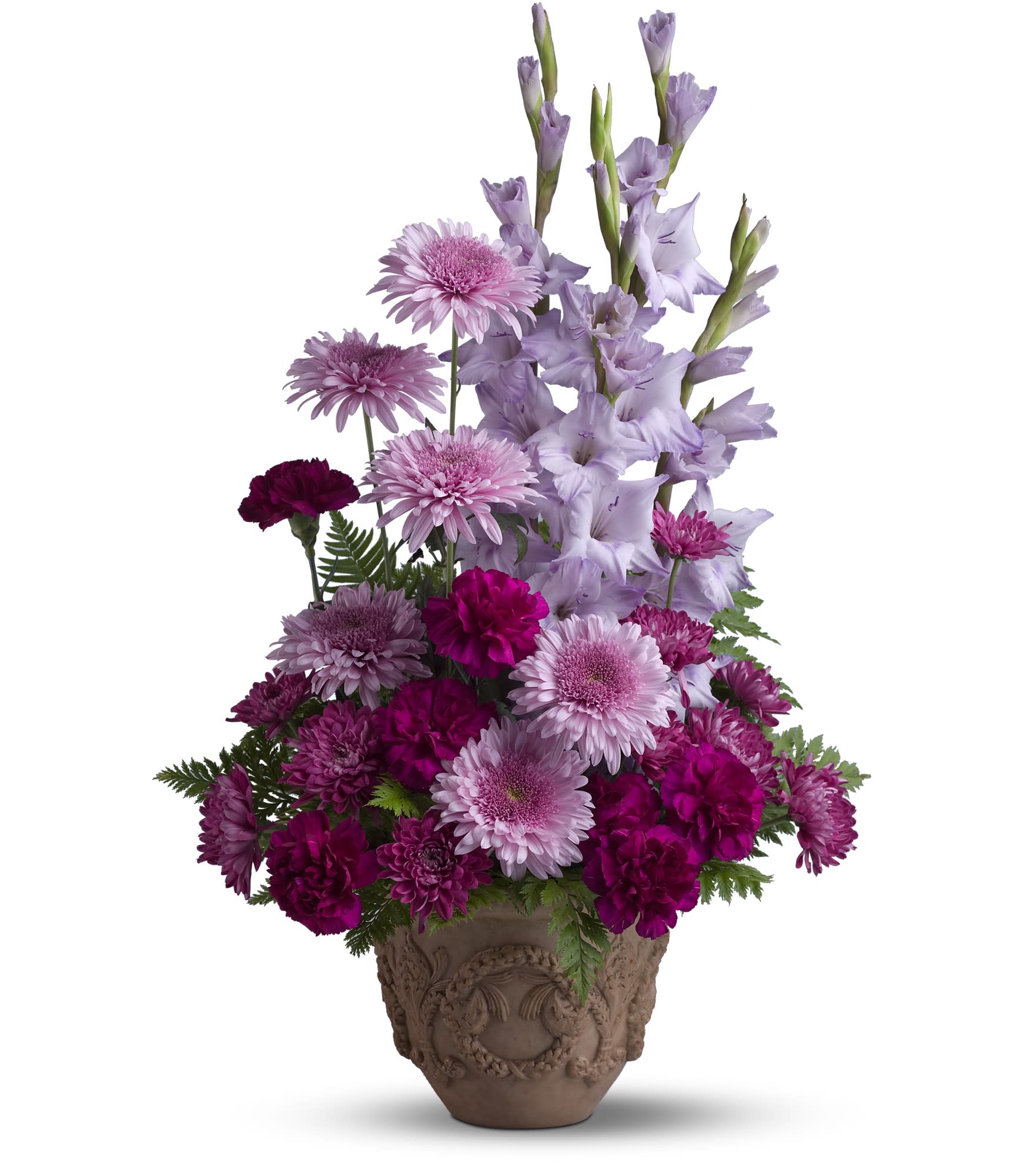Teleflora's Heartfelt Memories - A towering display of blooms such as gladioli, carnations and chrysanthemums in royal hues of purple and lavender, presented in a Grecian-style urn, is a gracious representation of your heartfelt sentiments at a funeral, memorial service or wake.  