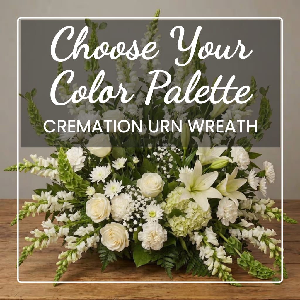 White floral cremation urn wreath with lilies, roses, and daisies