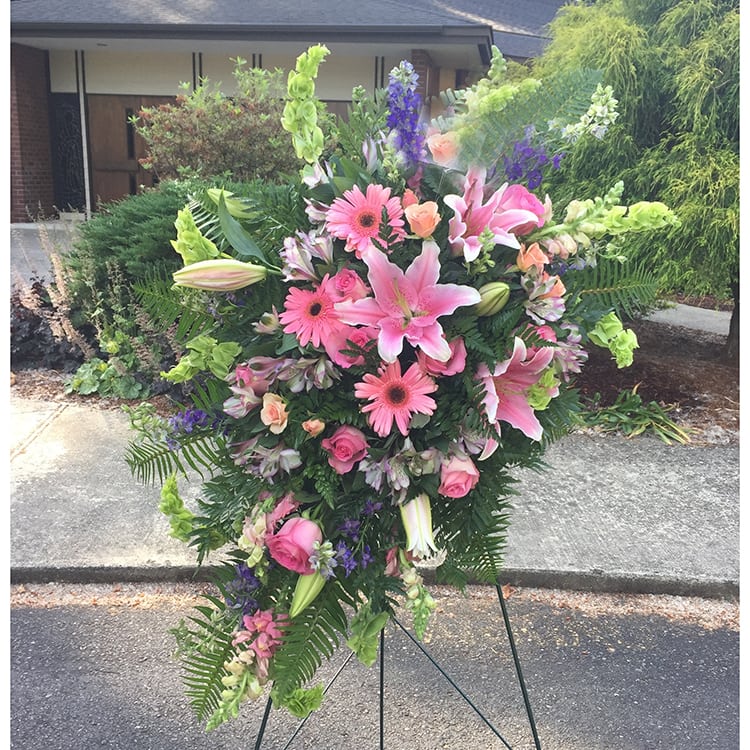 Large standing spray with pink lilies, gerbera daisies, and roses
