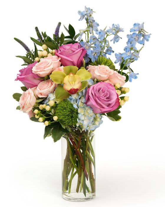 Pastel Vibes - A playful mix of pastel blooms in pink lavender, and blue, designed with fresh greenery and garden charm