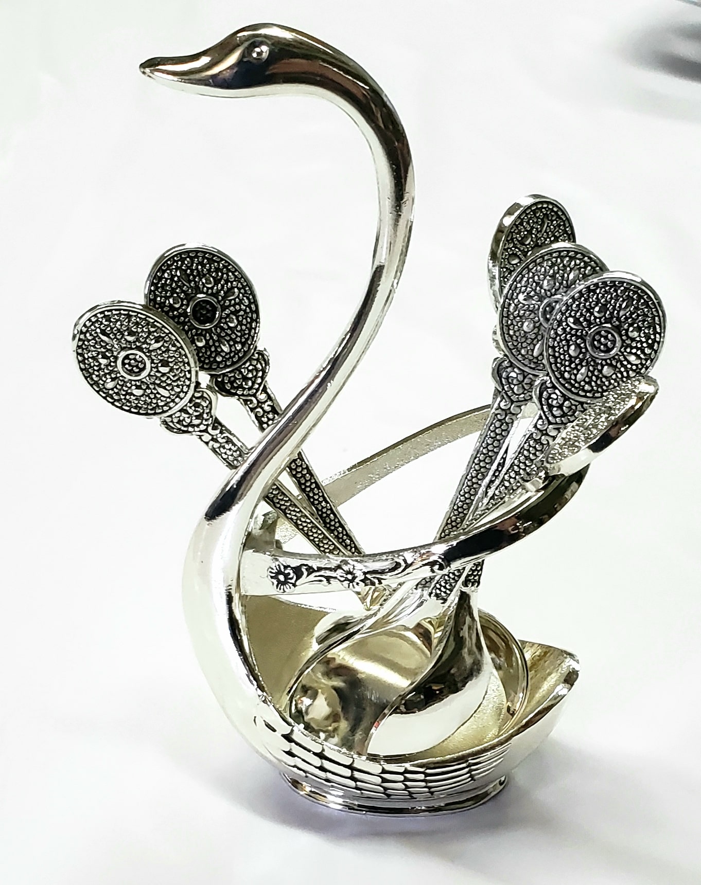 Decorative silver-toned metal swan-shaped basket with ornate handles