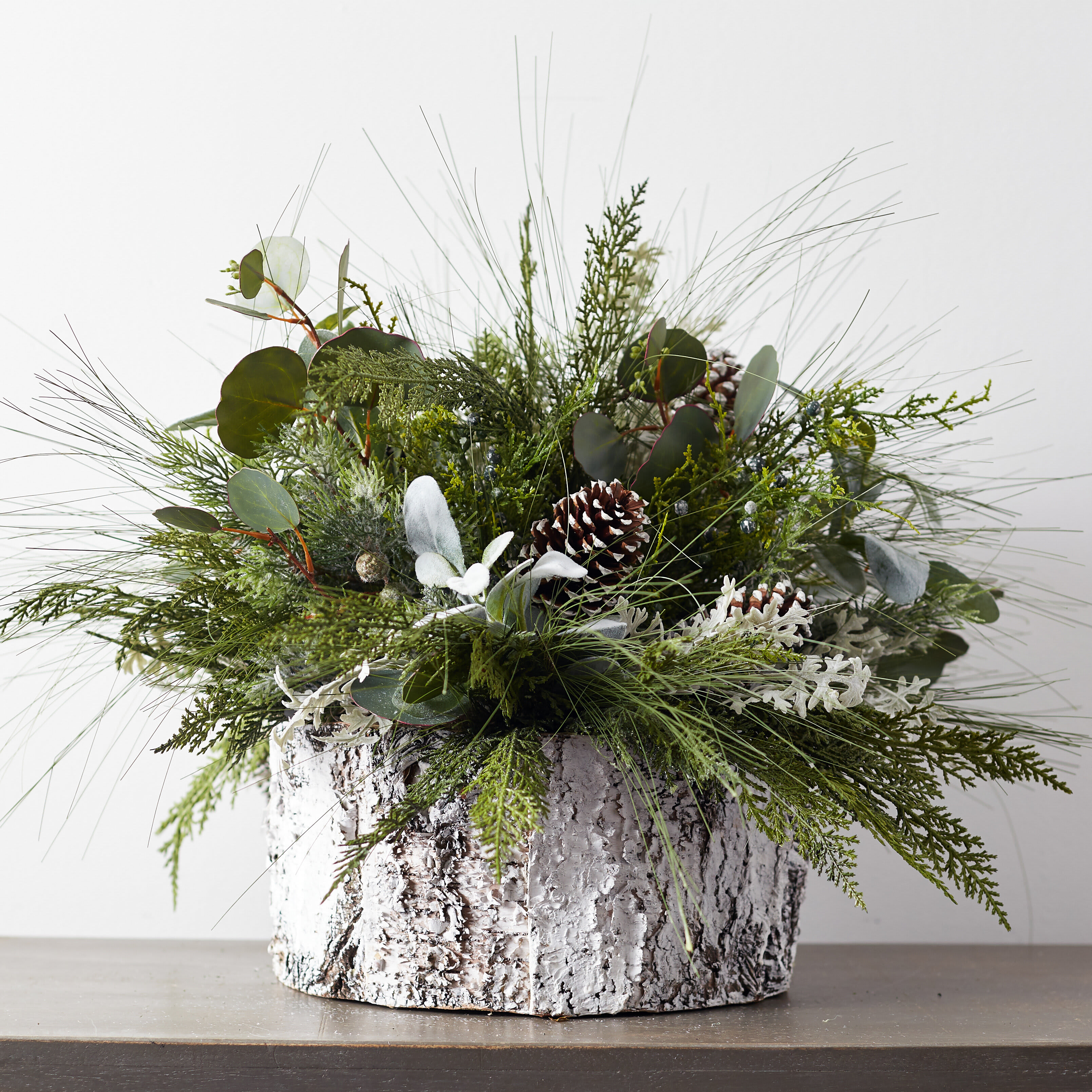 Just Green  - Green center piece in rustic container, with pinecones.