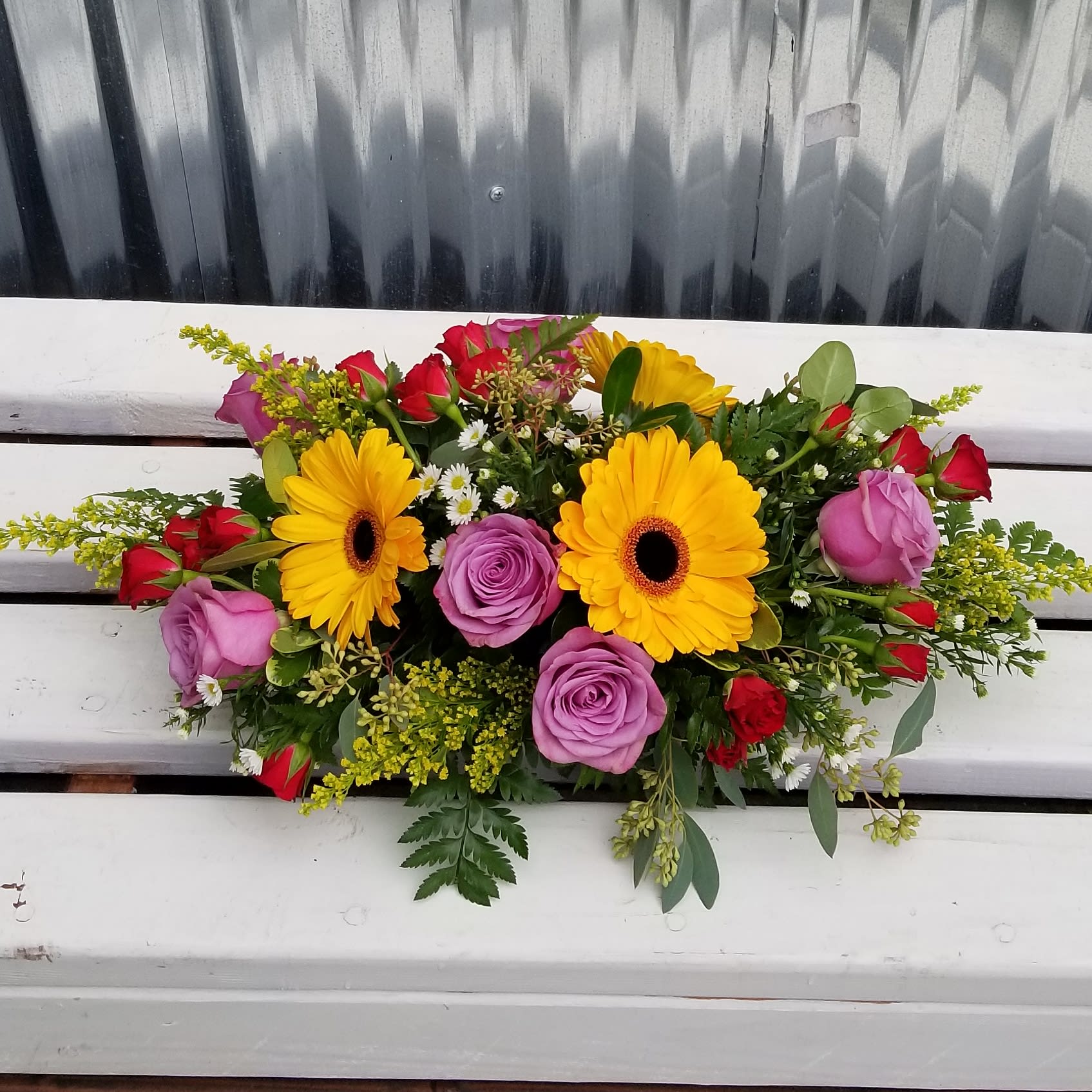 Bouquet of yellow gerbera daisies and pink roses