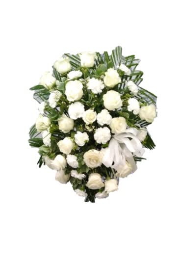 White rose and carnation bouquet with a white ribbon