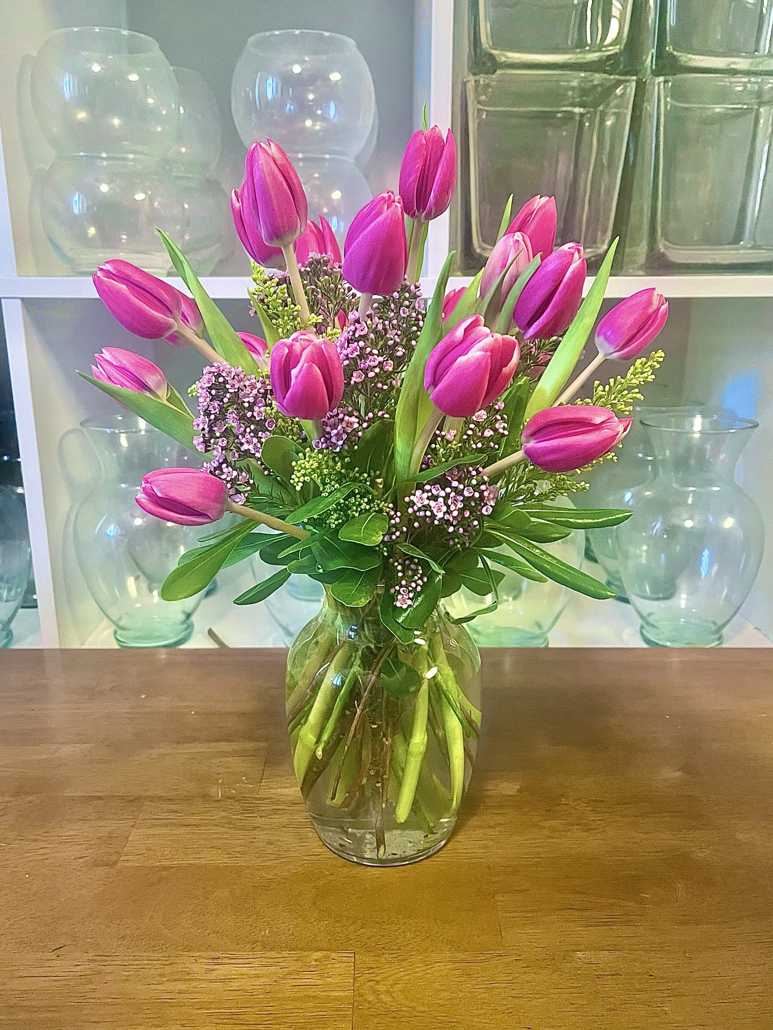 Pink tulips - 20 stems of pink tulips in a clear vase.