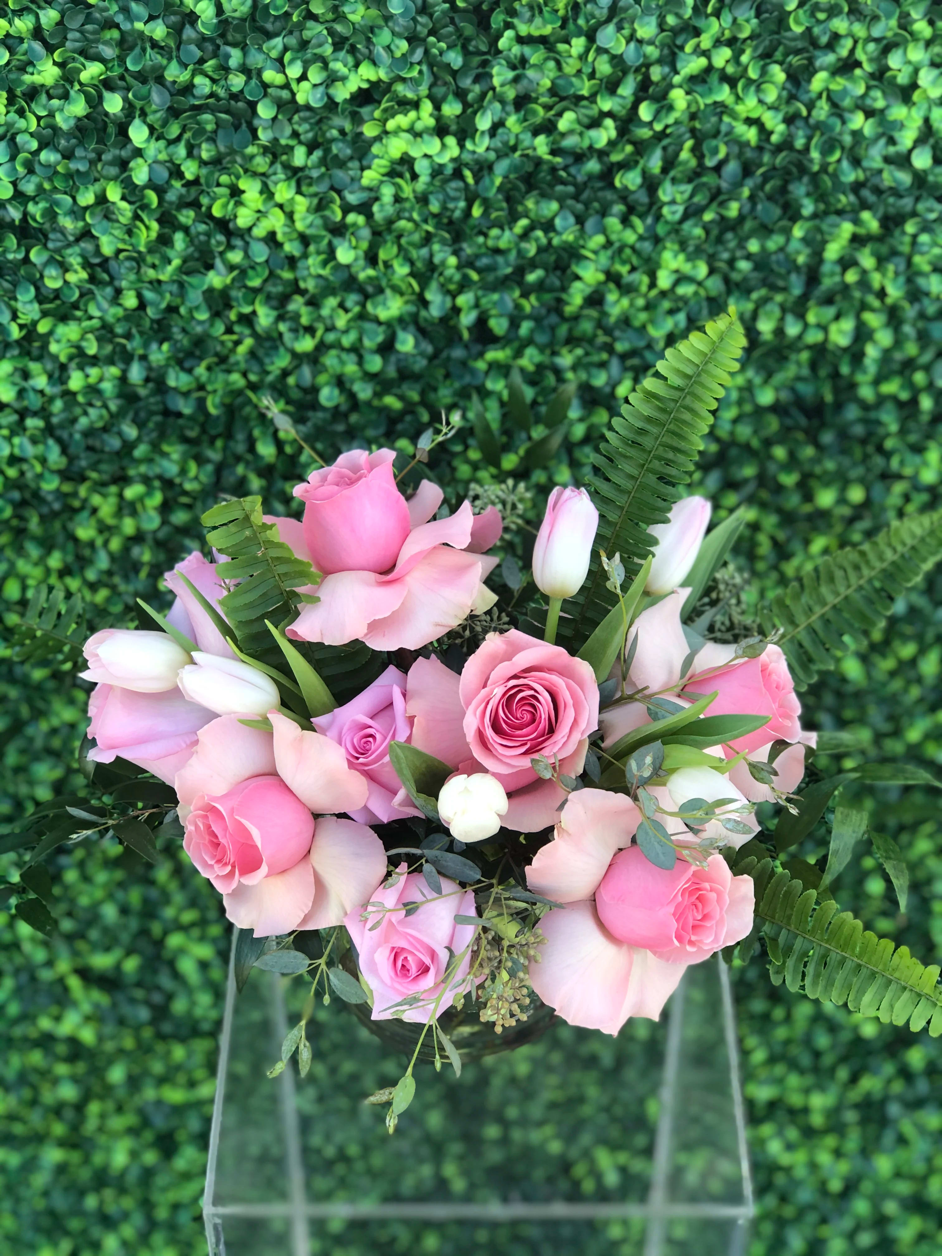 Pink rose bouquet with tulips and fern accents