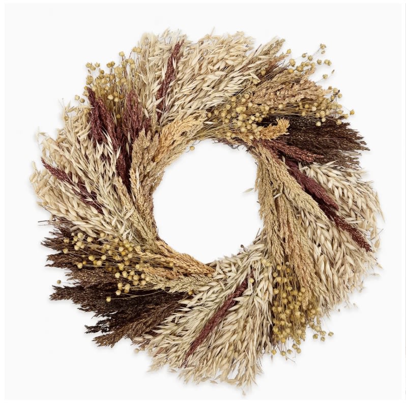 Autumn Grains Wreath - A lush harvest wreath that can both transition in and out of the holiday with its abundant grains, this wreath is made on a twig base with gorgeous aveena, flax, and assorted grains to fill the wreath out.  - 18" diameter - Each wreath comes in a wooden crate - Made with natural dried materials   - Please note that our wreaths are handmade of natural materials that can be damaged if exposed to rain, snow, or heavy wind. We recommend keeping our wreaths inside or on a covered  porch to protect the wreath.  Weight: 5 lb (2.27 kg)  Dimensions: 18 x 18 x 3.5 in (45.7 x 45.7 x 8.9 cm)