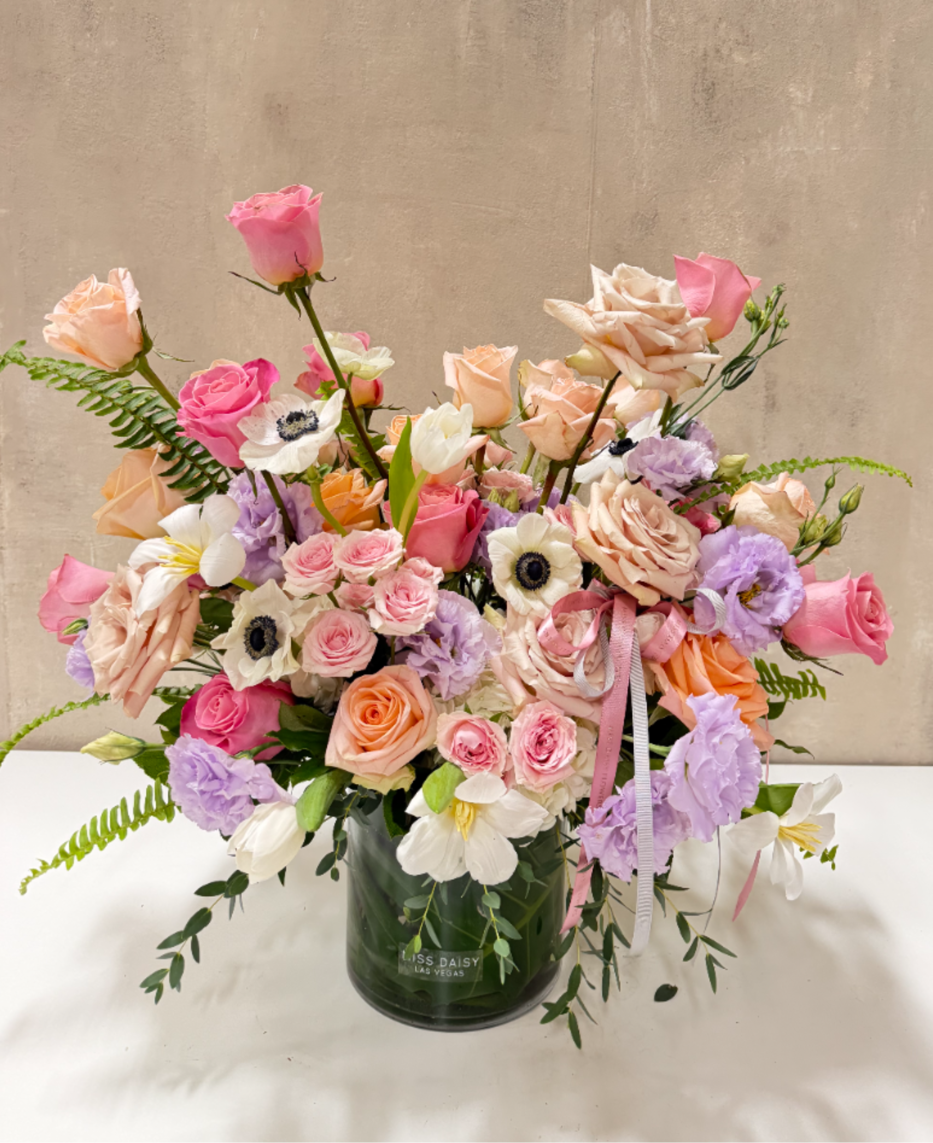 The Fairest Of Them All - Mirror mirror on the wall, is this the fairest flower arrangement of them all? We sure think so! This arrangement is big and juicy and a shop favorite! Order yours today!