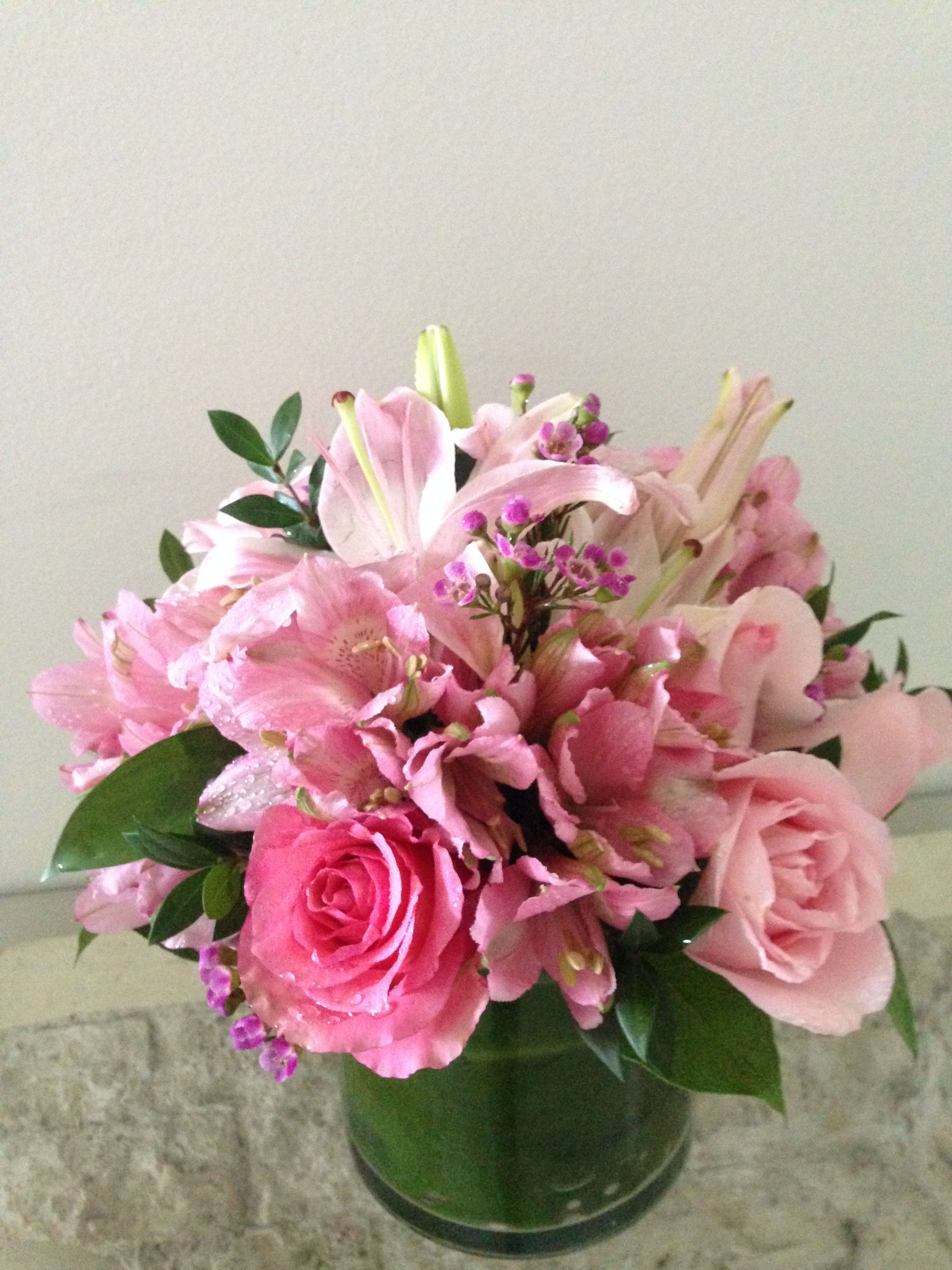 Pink mixed flower bouquet in a glass vase