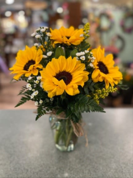 Sunflower bouquet in a clear glass vase