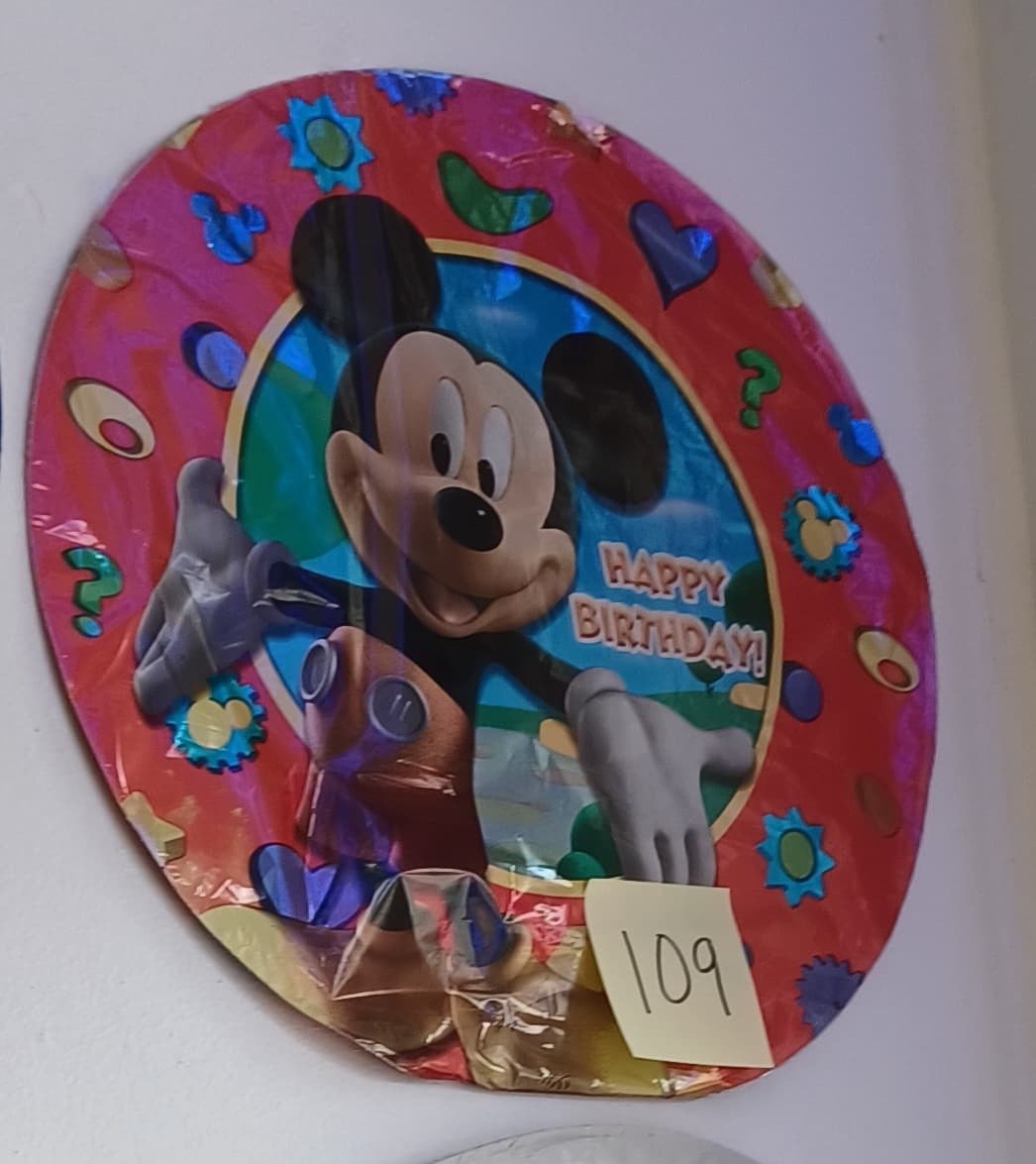 Mickey Mouse birthday balloon with colorful graphics