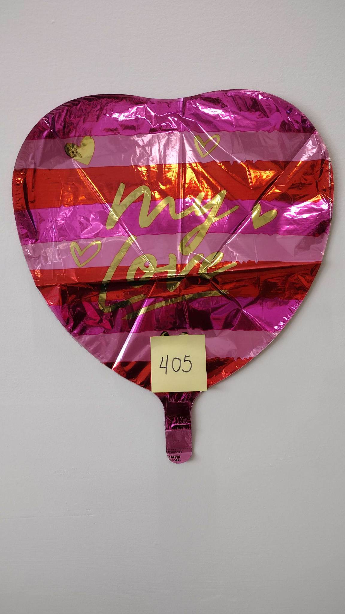 Heart-shaped pink foil balloon with "My Love" text and small hearts