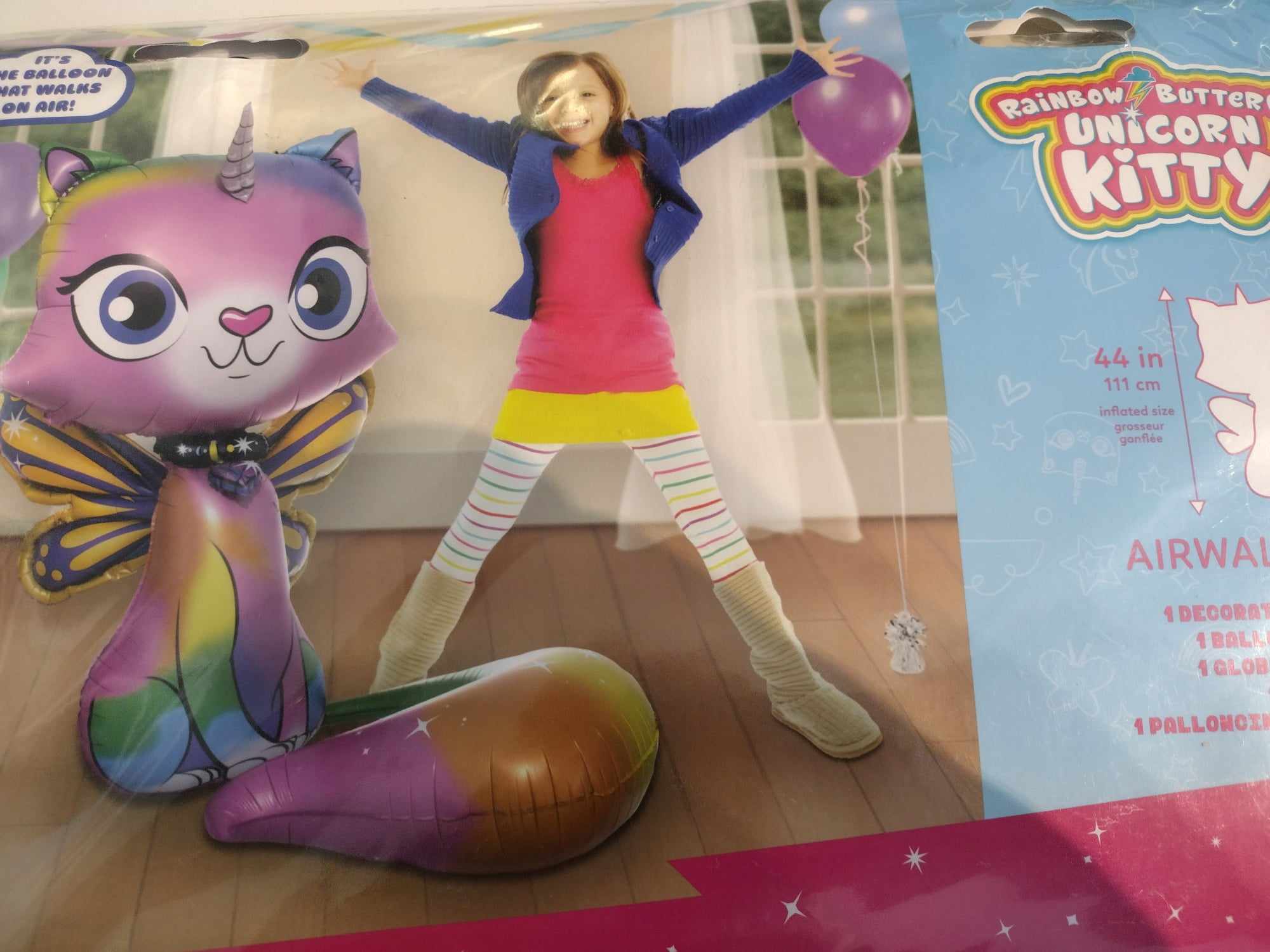 Rainbow unicorn cat balloon kit with a girl and purple balloon