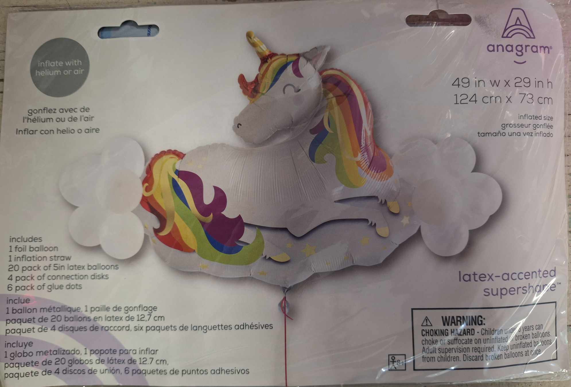 Unicorn-shaped foil balloon package with rainbow accents and cloud balloons
