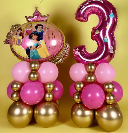 Princess-themed balloon arrangement with a pink number 3 balloon