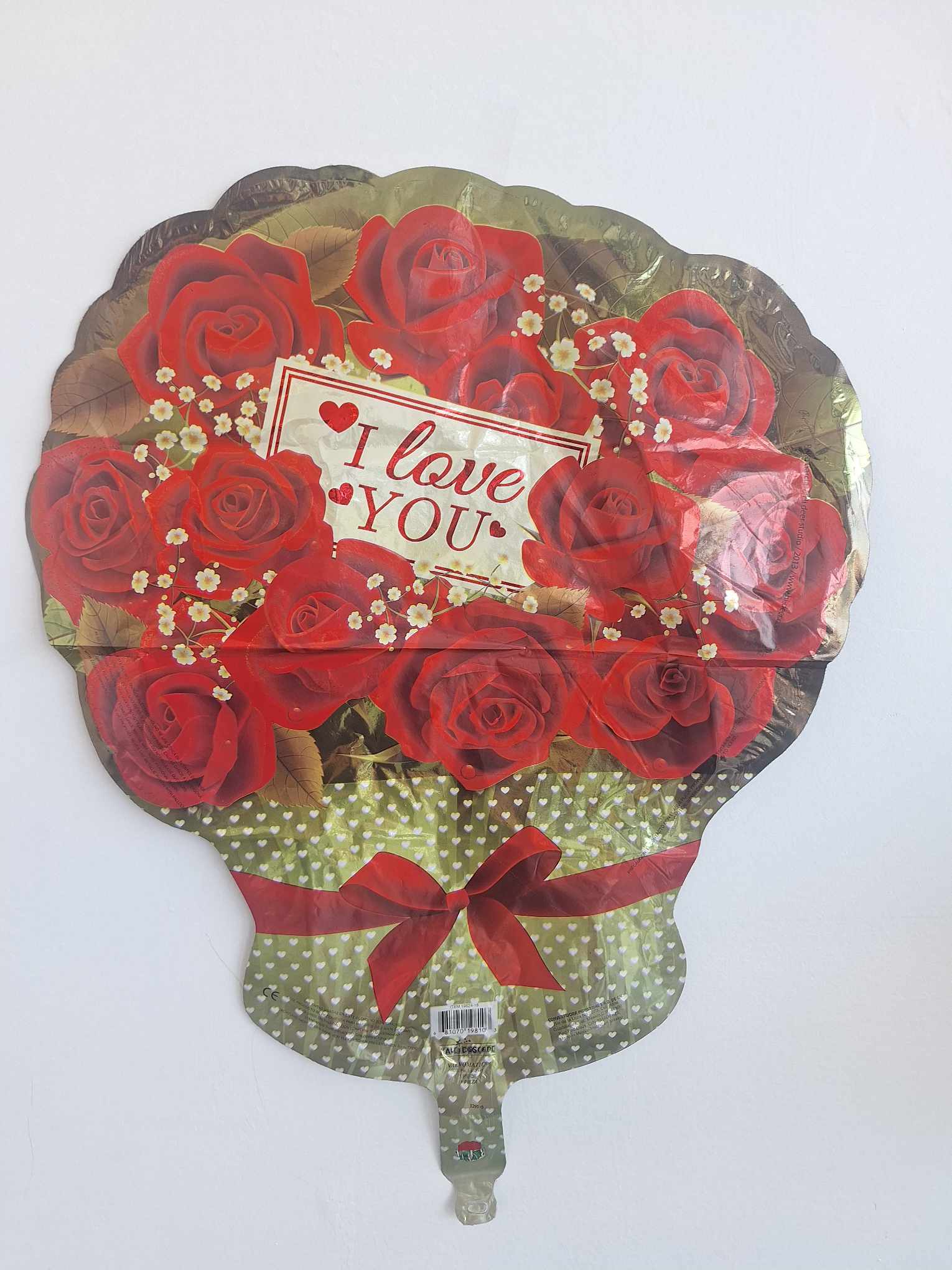 Heart-shaped balloon with red roses and an "I love you" message