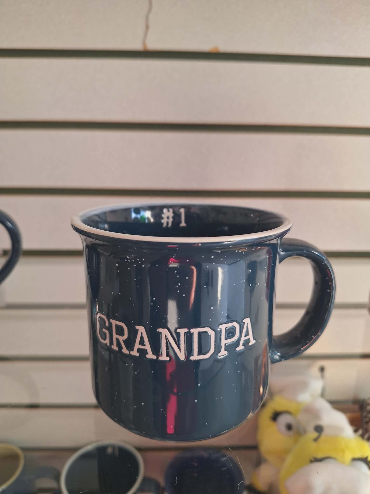 Dark mug with the word GRANDPA printed on it