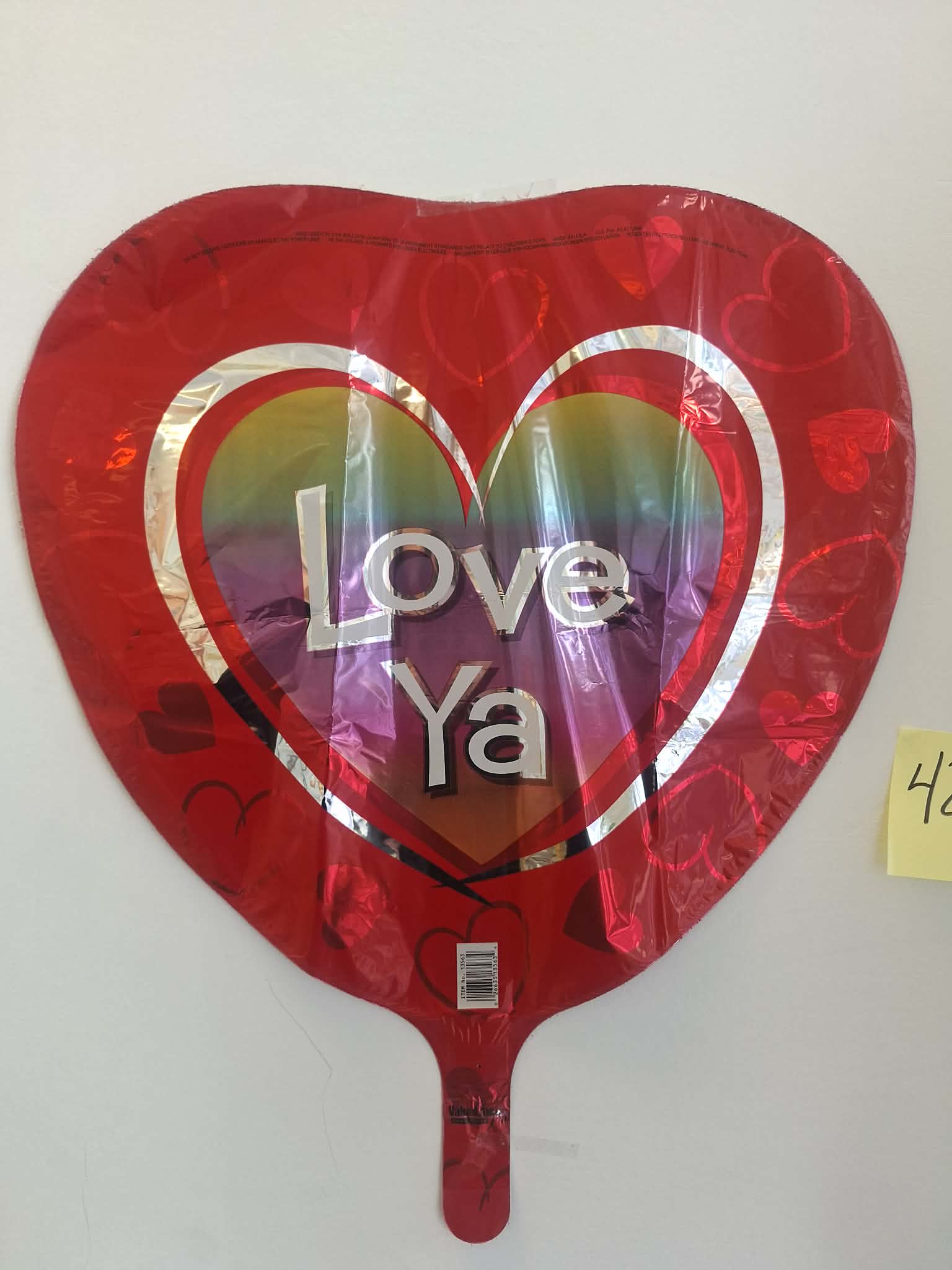 Love Ya! (#420) - 18in mylar balloon that you can add to any balloon bouquet, stuffed animal, mug, or box of chocolates. *if you're ordering multiple balloons individually (not in an already advertised set or tied to a flower arrangement/stuffed animal) you will need to purchase a balloon weight otherwise the balloons will need to be picked up*