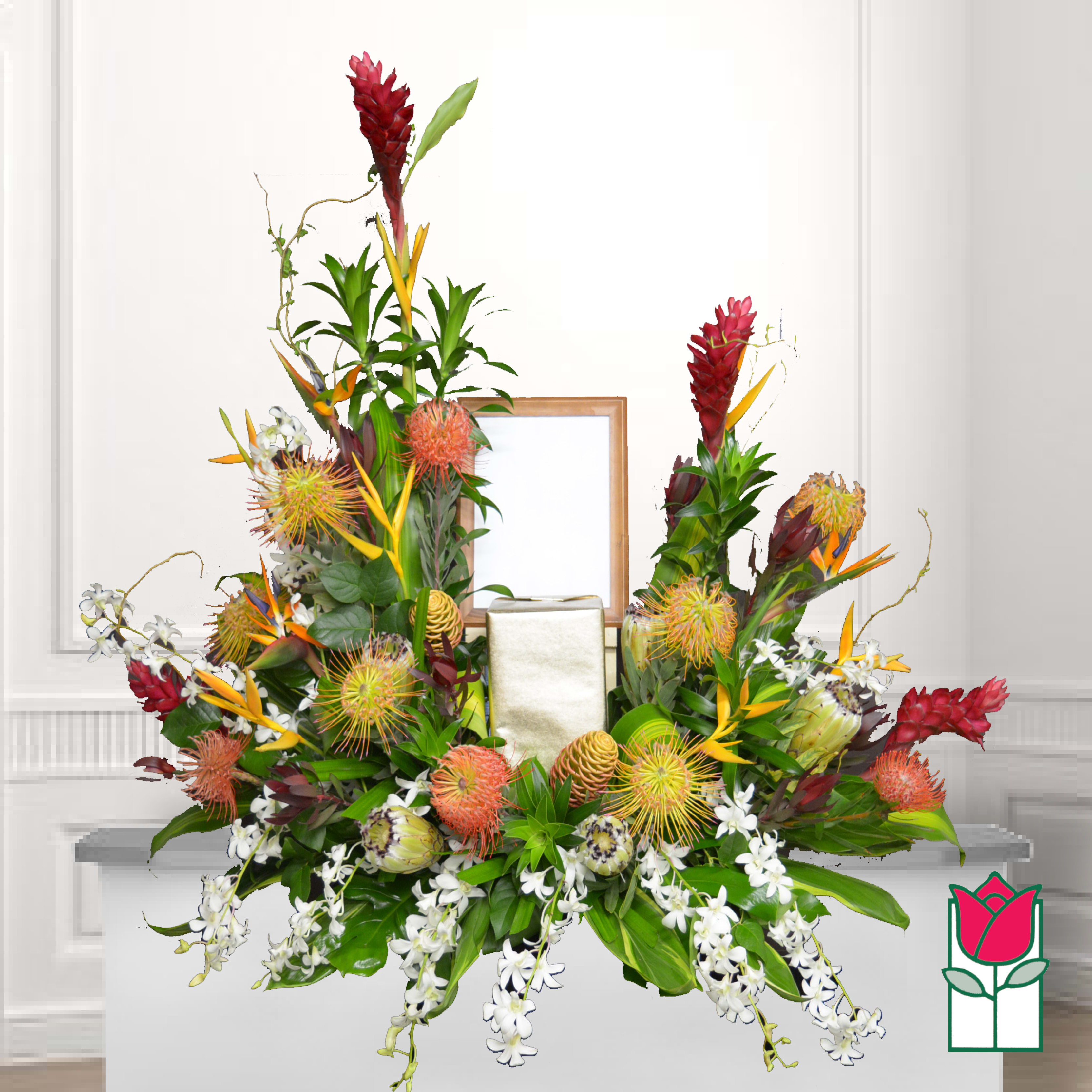 Tropical floral arrangement with red ginger, bird of paradise, and white orchids