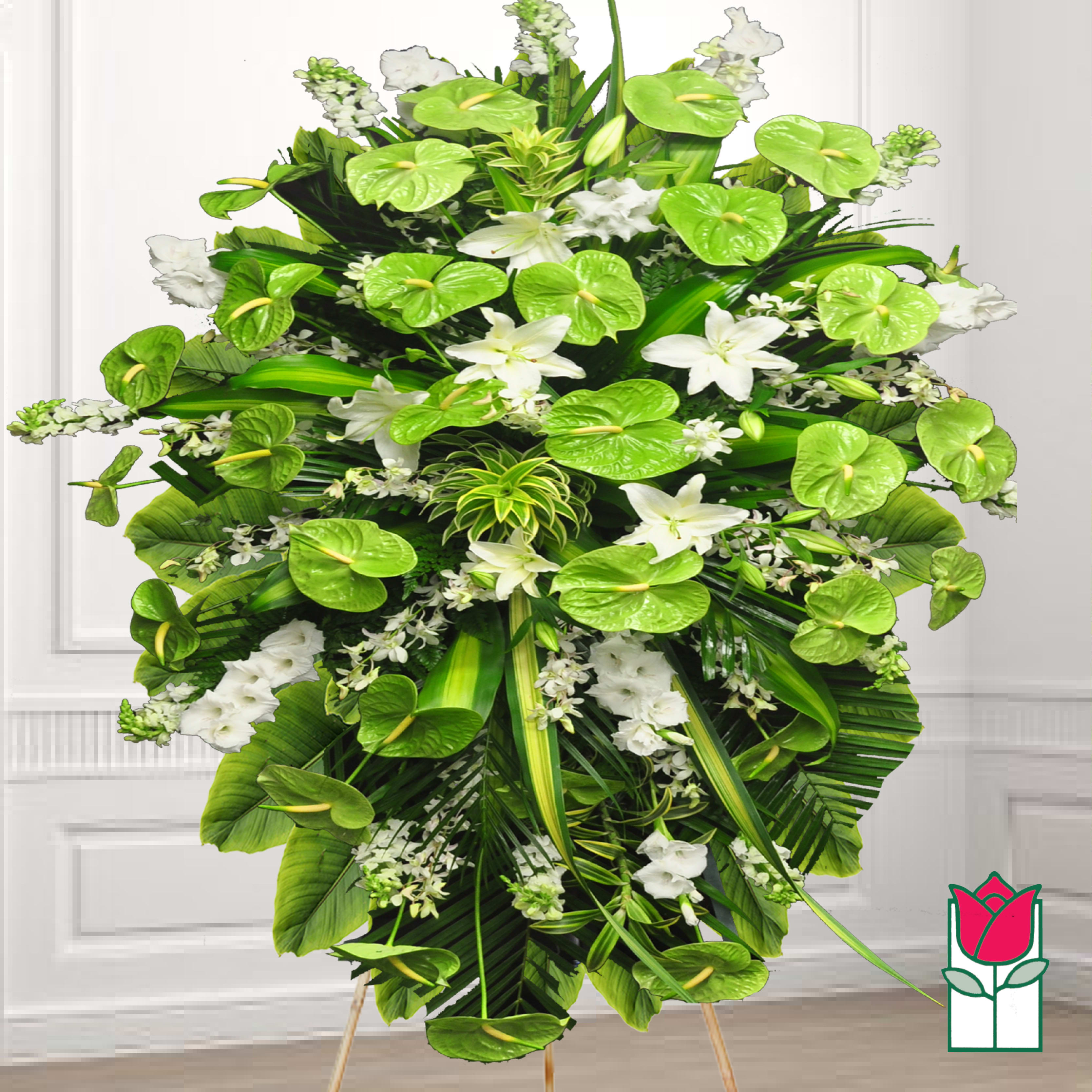 Large standing floral spray with white lilies and bright green anthuriums