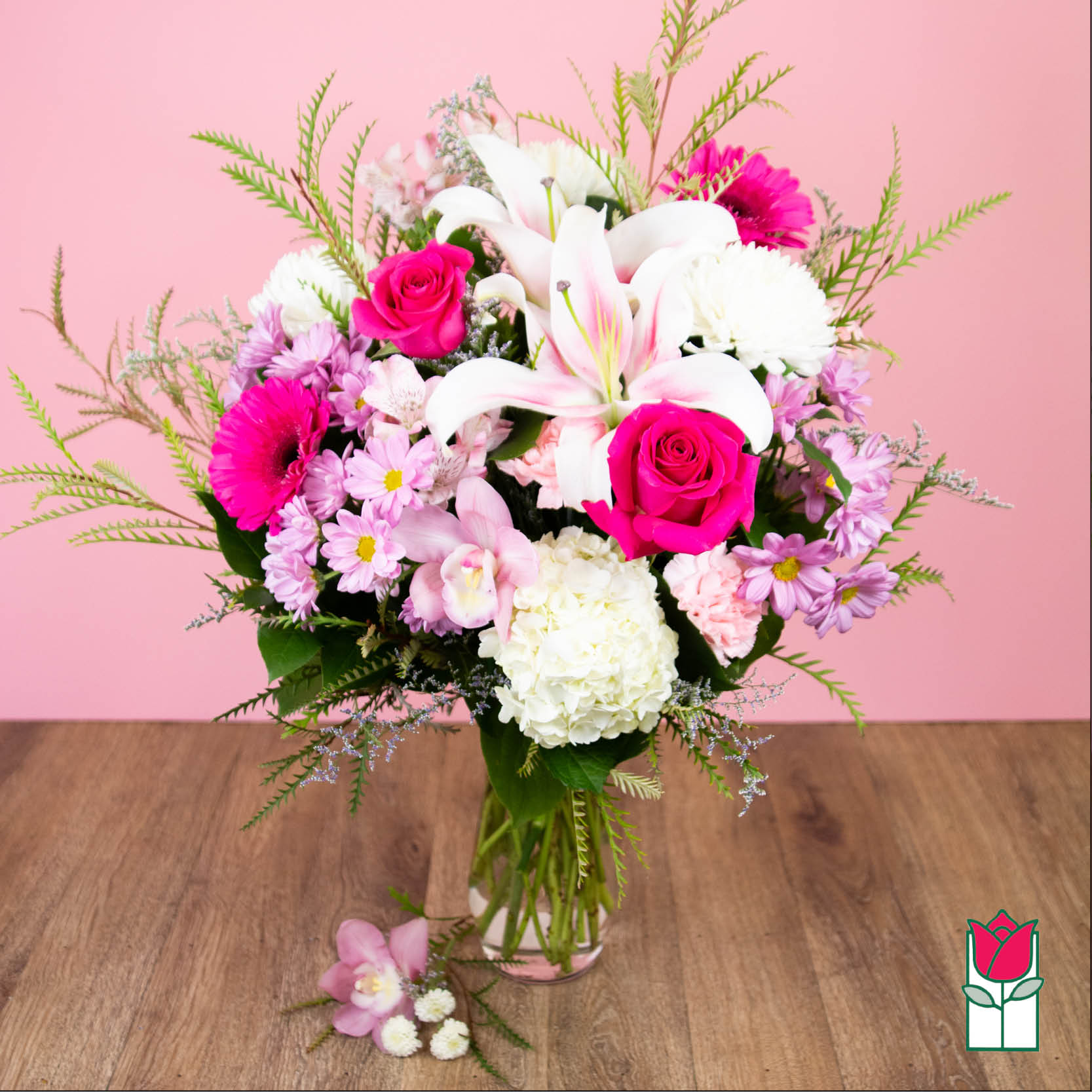 Pink and white mixed bouquet in a clear glass vase
