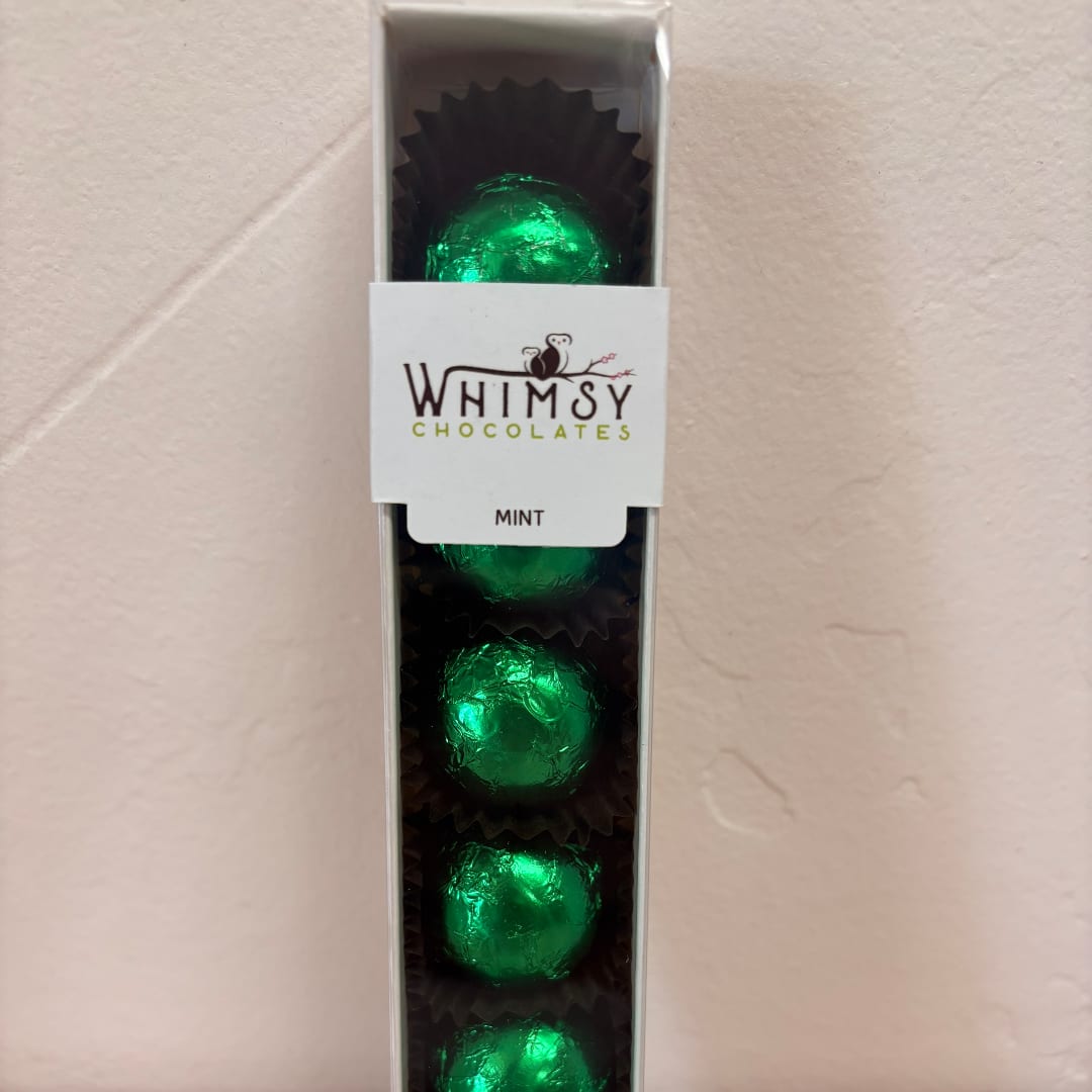 Box of green foil-wrapped mint chocolates