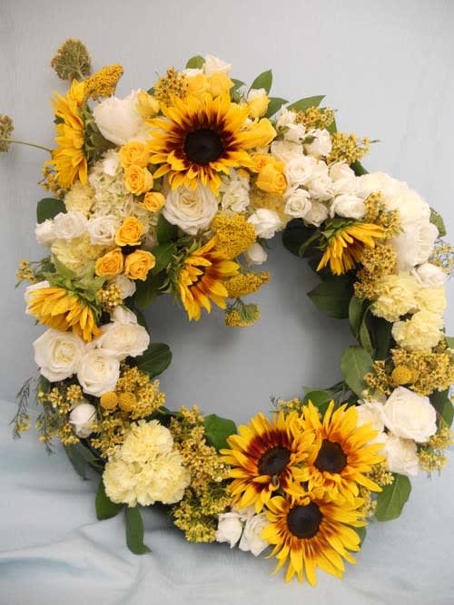 Sunflower and white rose wreath with yellow accents