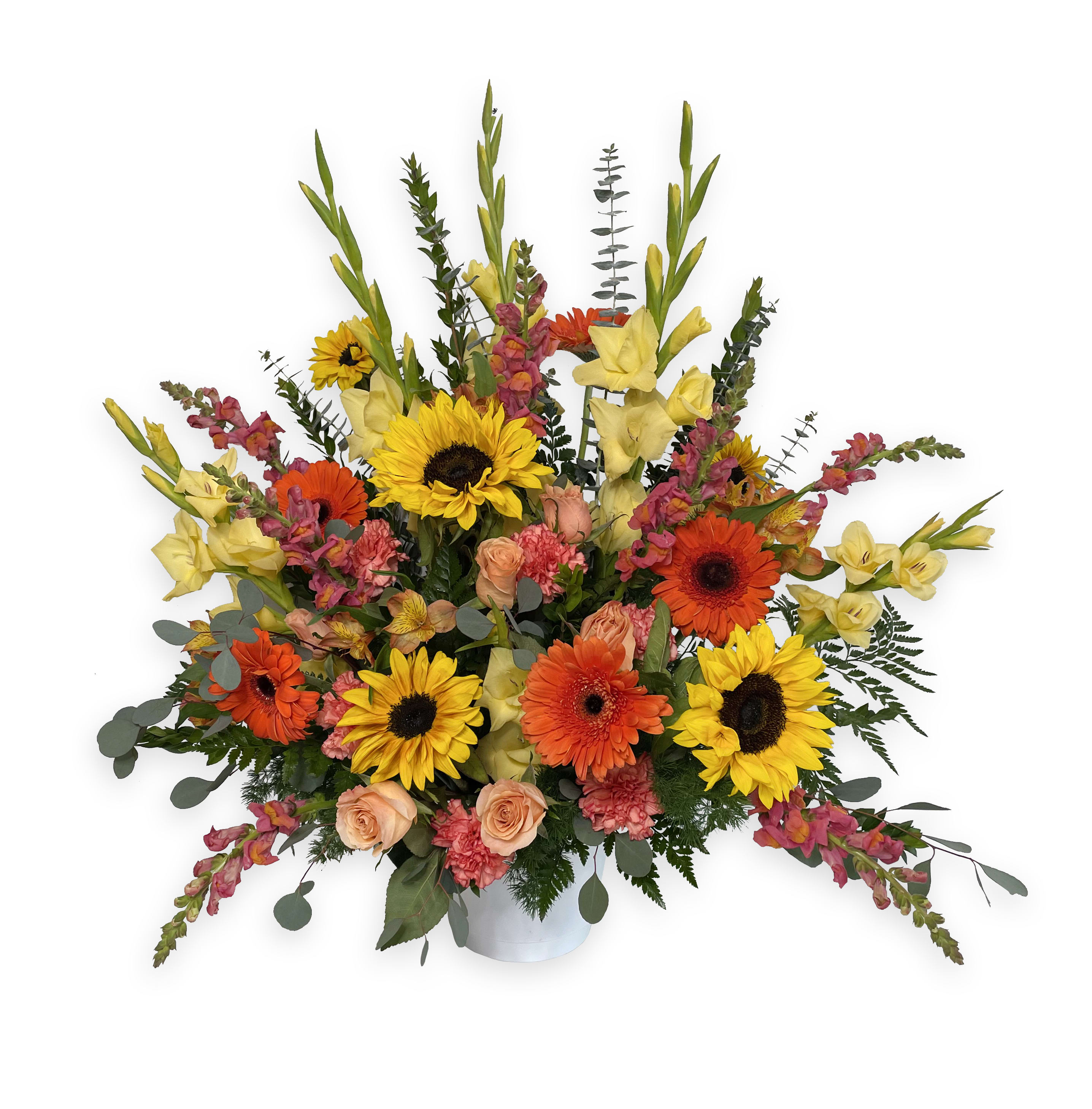 Large mixed bouquet with sunflowers, gerbera daisies, roses, and yellow gladiolus in a vase