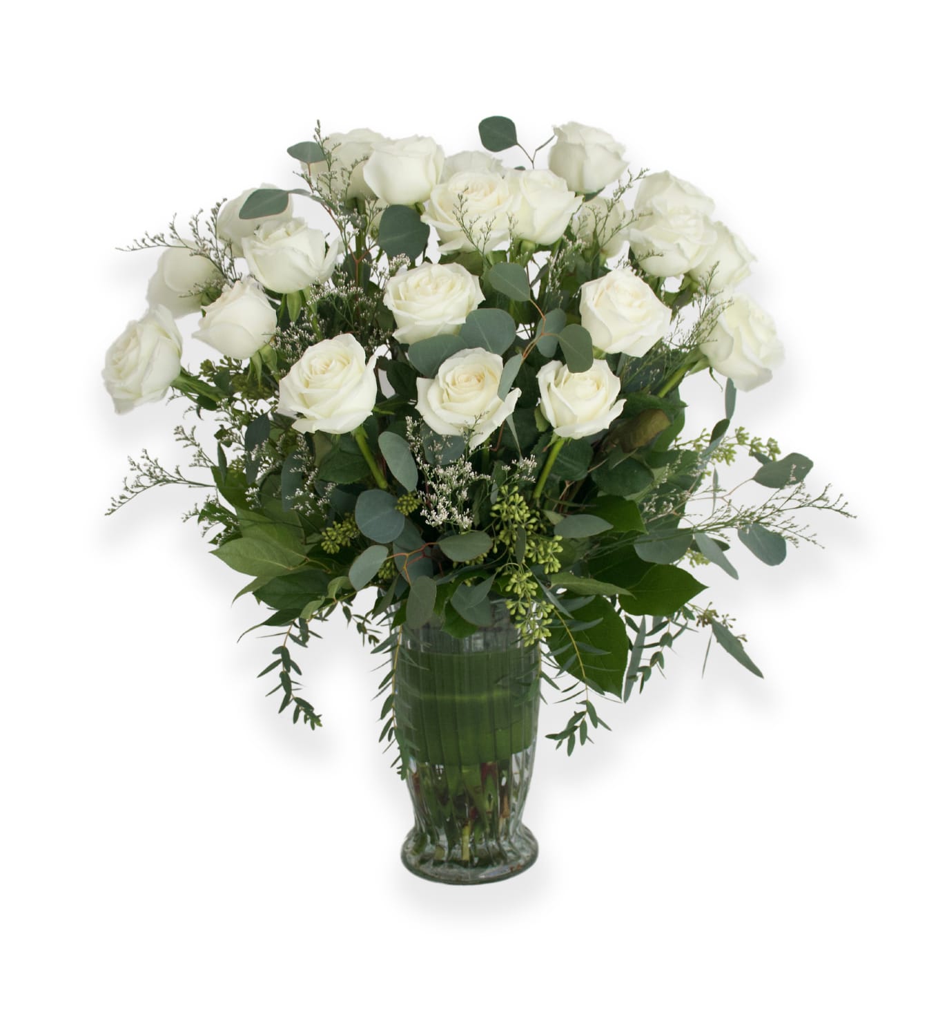 White rose bouquet in a clear glass vase