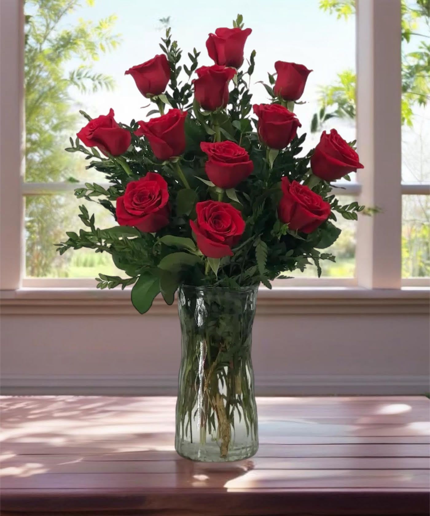 1 Dozen Roses  - For classic romance, a dozen red roses is always the perfect choice. One dozen long-stemmed red roses in a clear glass vase.  Please specify if you would like another color of rose in Florist instructions and we will do our best to accomodate your request. 