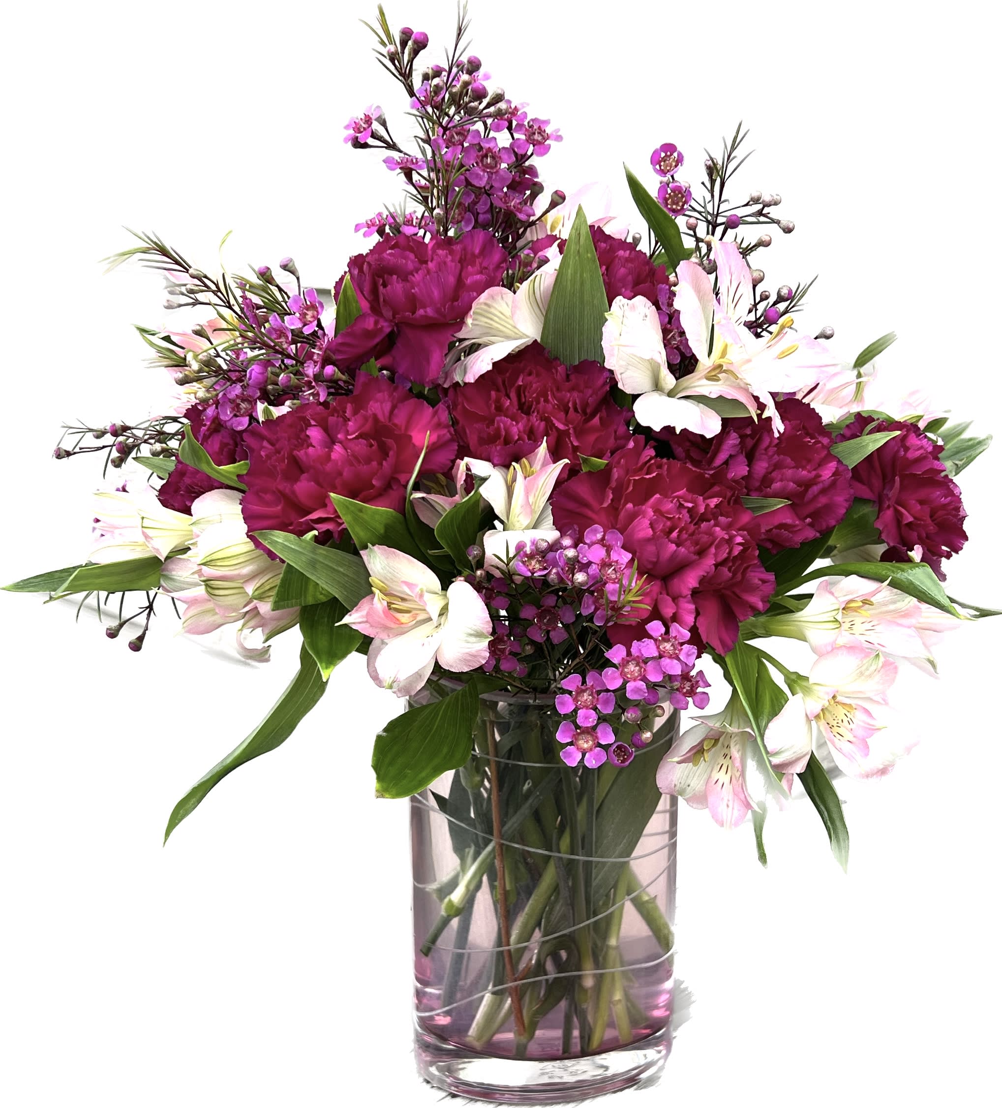 Pink and white bouquet in a clear glass vase