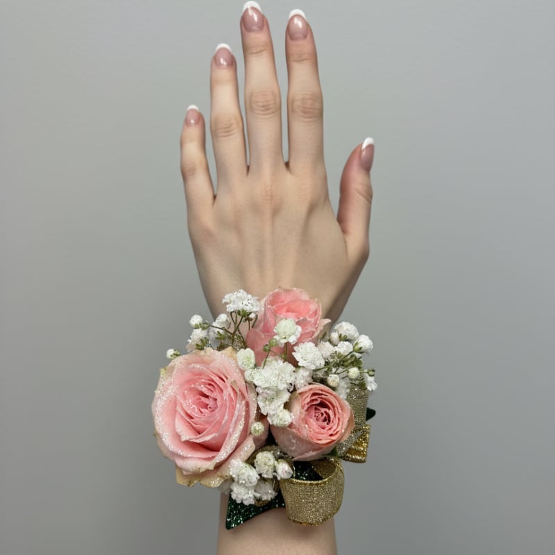 Little Golden Girl Corsage - Pink (elementary school size) - The perfect corsage for your "Golden Sweetheart" with three pink baby roses, accent flower, gold ribbon, shimmer on a petite gold wristlets to fit your little one.