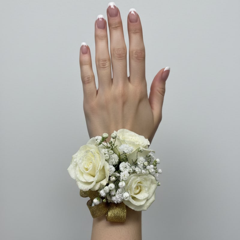 Little Golden Girl Corsage - White ( elementary school size) - The perfect corsage for your "Golden Sweetheart" with three pink baby roses, accent flower, gold ribbon, shimmer on a petite gold wristlet to fit your little one.