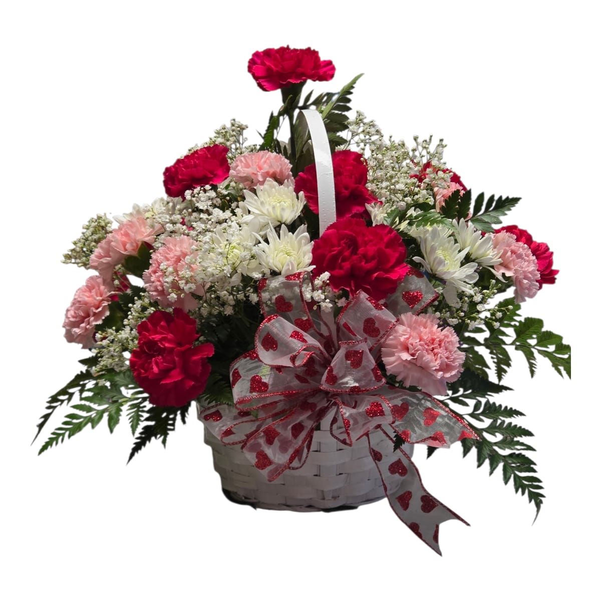 Basket arrangement of pink and white carnations with a heart ribbon