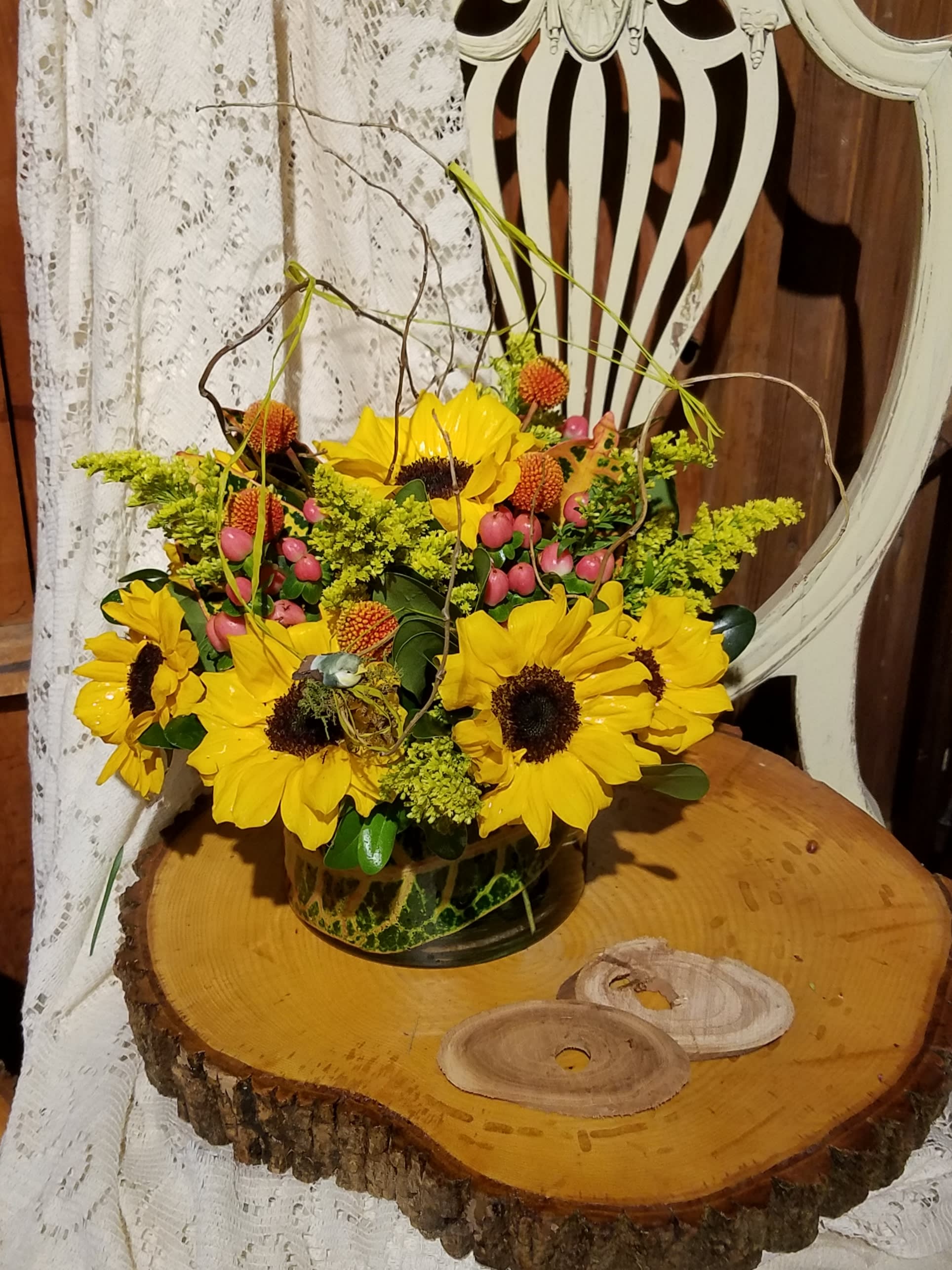 Eckert Florist's Stunning Sunflower Bouquet - This beautiful fresh arrangement features an abundance of sunflowers accented with other seasonal filler flowers. *Flowers and colors may vary