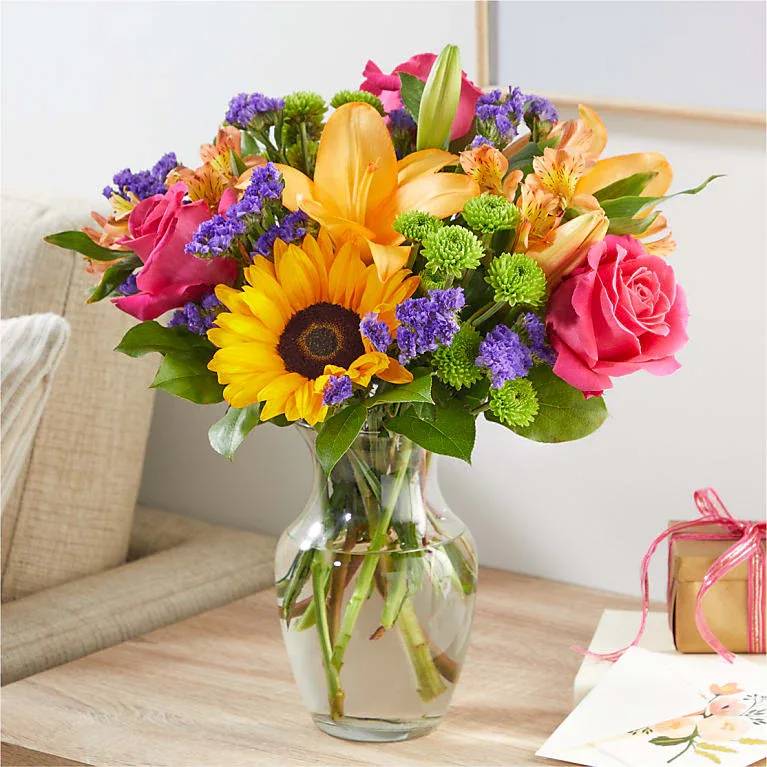 Eckert Florist's FTD Joyful Bouquet - Delight and jubilation arrive at their doorstep with this colorful bouquet of blooms, sure to make this their best day. Flower varieties and colors may vary.