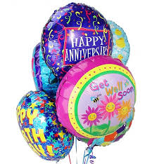 Cluster of colorful anniversary and get well balloons