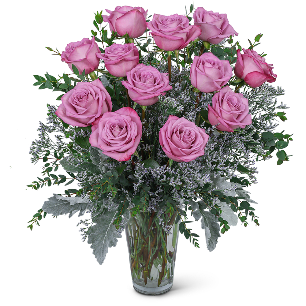 One Dozen Angelic Lavender Roses  - Our One Dozen Angelic Lavender Roses is a heavenly flower arrangement that radiates beauty and grace. This exquisite arrangement features 12 stunning lavender roses, delicately arranged in a classic vase and surrounded by lush greenery. The soft, pastel hue of the roses evokes a sense of serenity and tranquility, making it the perfect gift for those who appreciate beauty and elegance. The Angelic Lavender Roses arrangement is ideal for expressing sentiments of love, admiration, and gratitude, making it perfect for occasions such as Mother's Day, birthdays, and other special events.