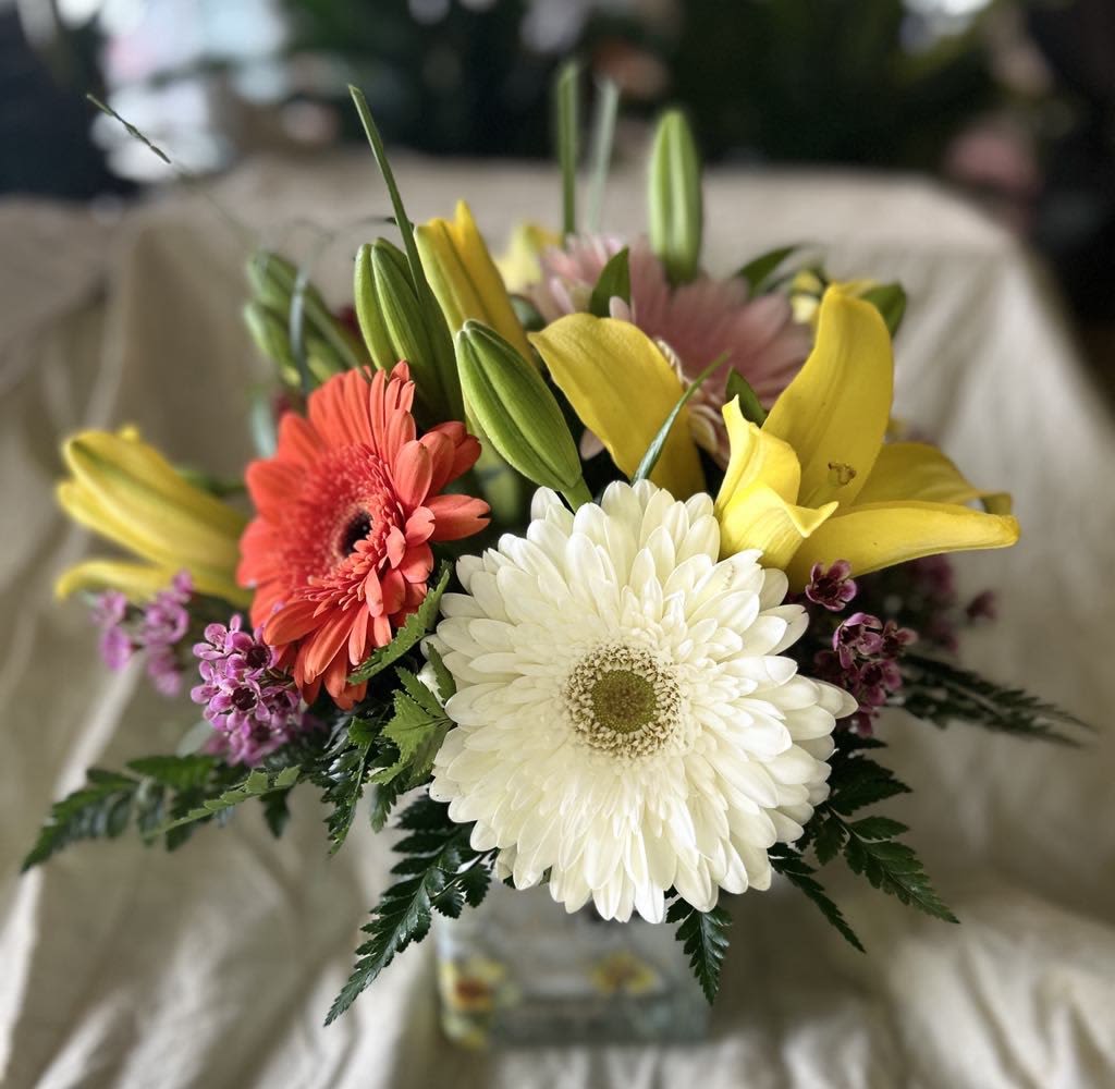 Mixed bouquet with gerbera daisies and yellow lilies