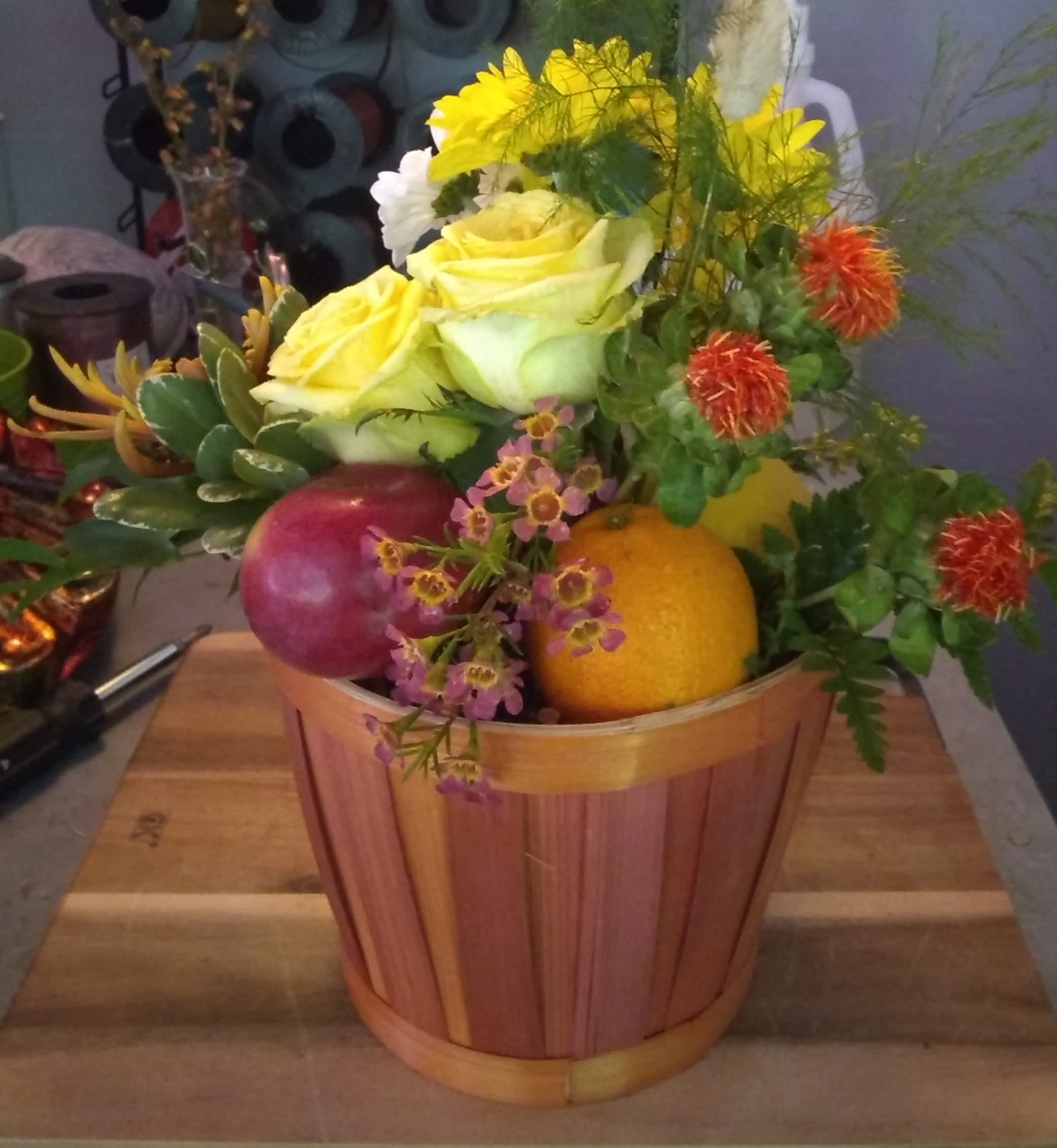 Fruit and flowers - A basket with fresh fruits and flowers