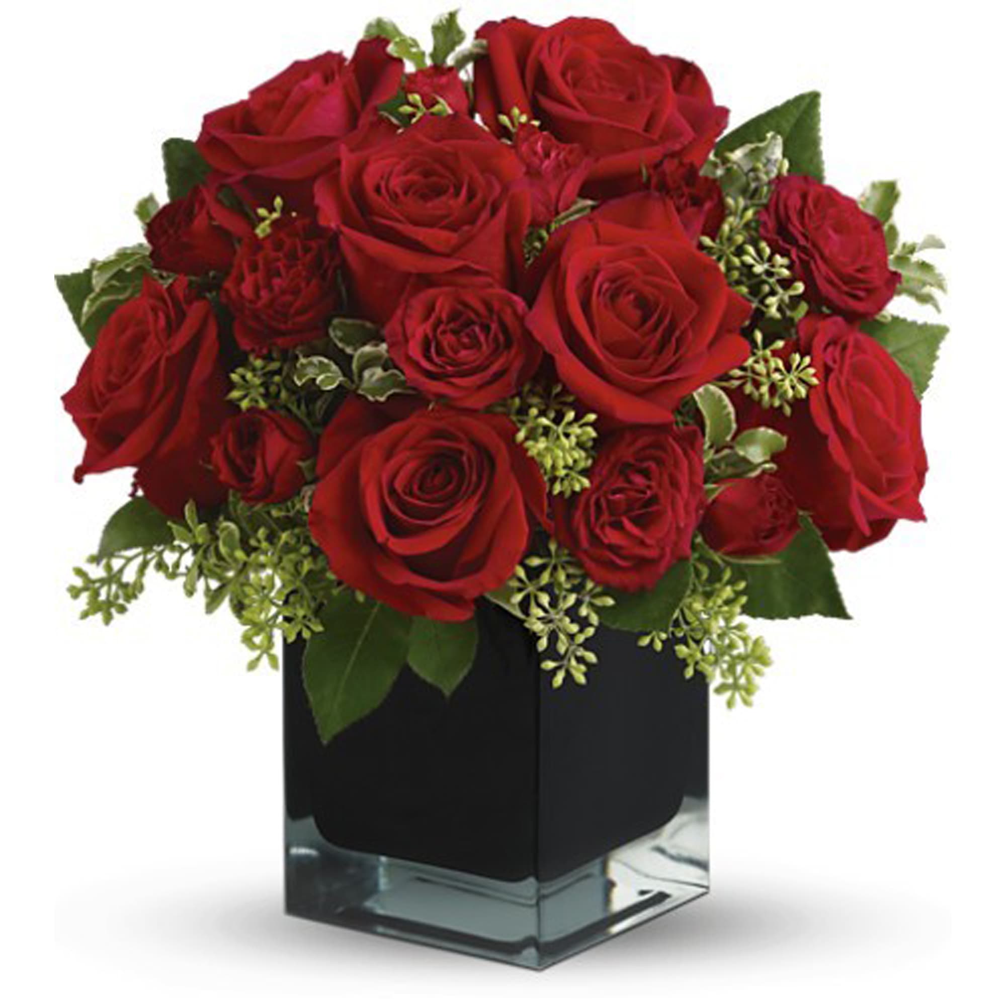 Teleflora's Ravishing Reds - Lush, lavish and spectacularly chic, this gorgeous contemporary bouquet of red roses in a stunning black cube vase makes an exciting gift for almost anyone. Wouldn't you love for someone to send it to you?  The brilliant bouquet includes red roses and red spray roses.  Delivered in a black contemporary glass cube vase.  Bouquet is approximately 11.5" H x 10.75" W  Orientation: All-Around  As Shown : TFWEB596