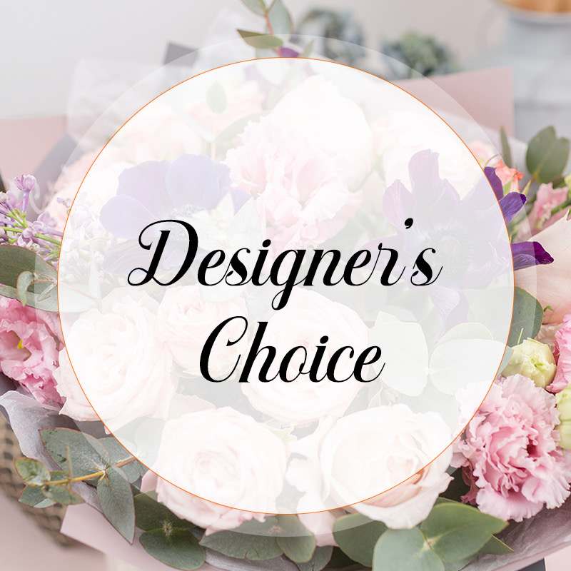 Pastel bouquet with pink and white flowers and eucalyptus, overlaid with "Designer's Choice" text