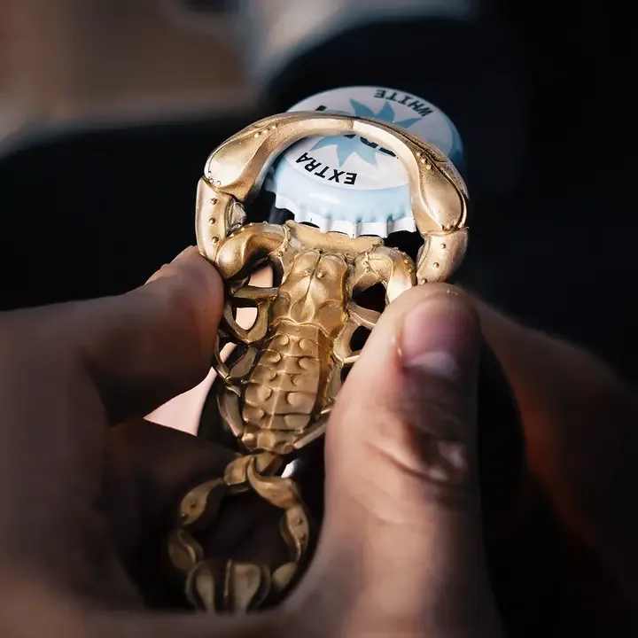 Scorpion Bottle Opener - Brass Scorpion Bottle Opener  About  Wild and Exotic Design. The scorpion may be small, but its presence instantly brings fear around it. Although only 30 species out of 1,500 are considered deadly, you still want to be wary of this creature, especially if you see one crawling toward you. The ancient Egyptians deified the scorpion, using it to represent their goddess Serqet, protector of the dead. Physicians who became adept at healing scorpion bites were considered Followers of Serqet.  Today, scorpions are considered symbols of determination, transformation, and rebirth. Their stealthy methods for hunting prey make them savage predators in their own right.
