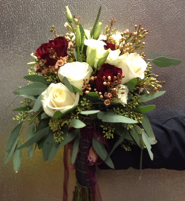 wedding - let us custom arrange your wedding bouquet . Give us a call and we will talk about your wedding plans. We can do just your bridal flowers or we can decorate the church and reception  with bouquets and centerpieces