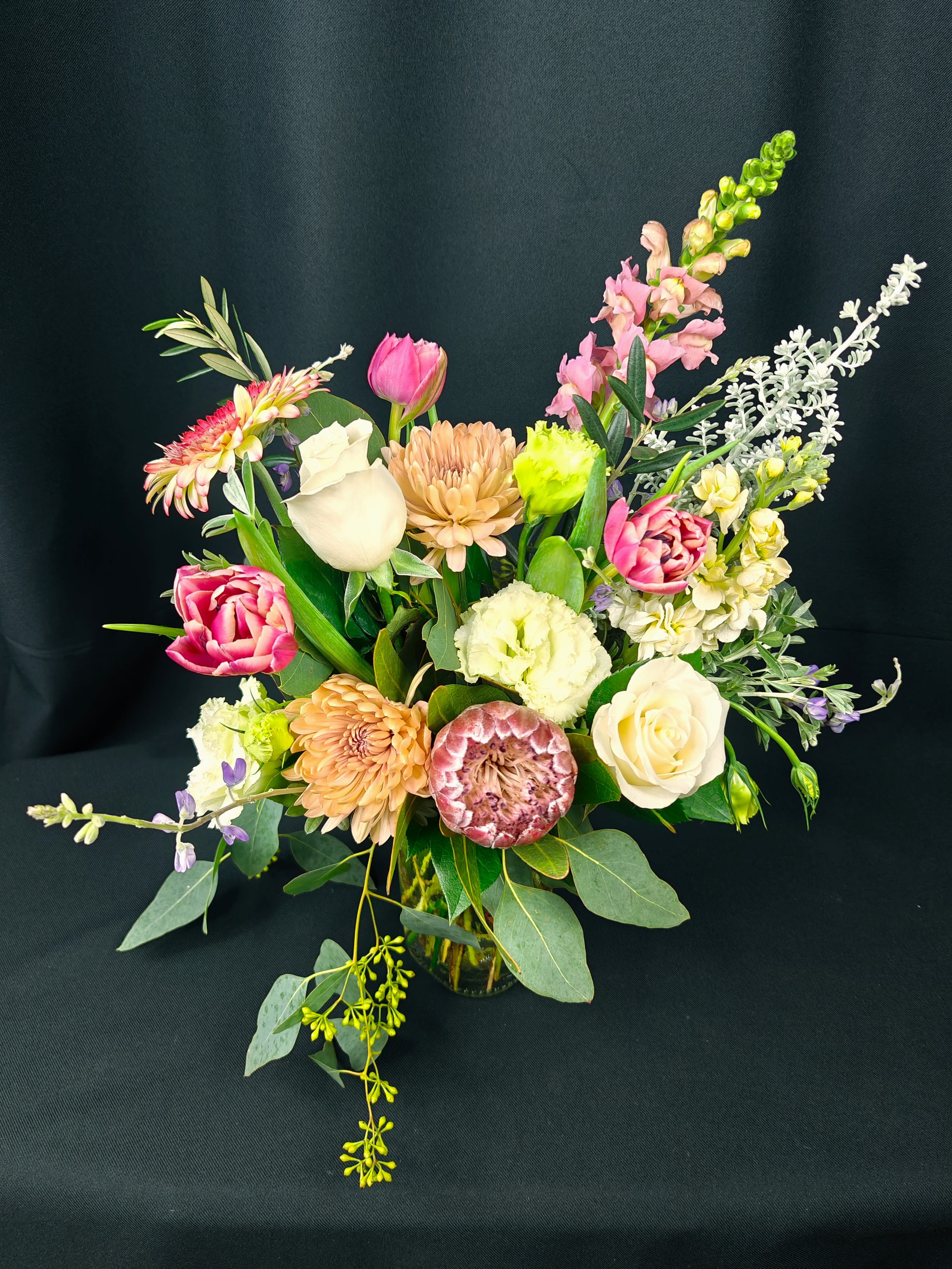 Handful of Rustic Blooms - Very pretty assortment of import and local flowers in season. Flowers and colors will vary. Rustic in nature and style with that fresh 'picked' look as if you grew them yourself.