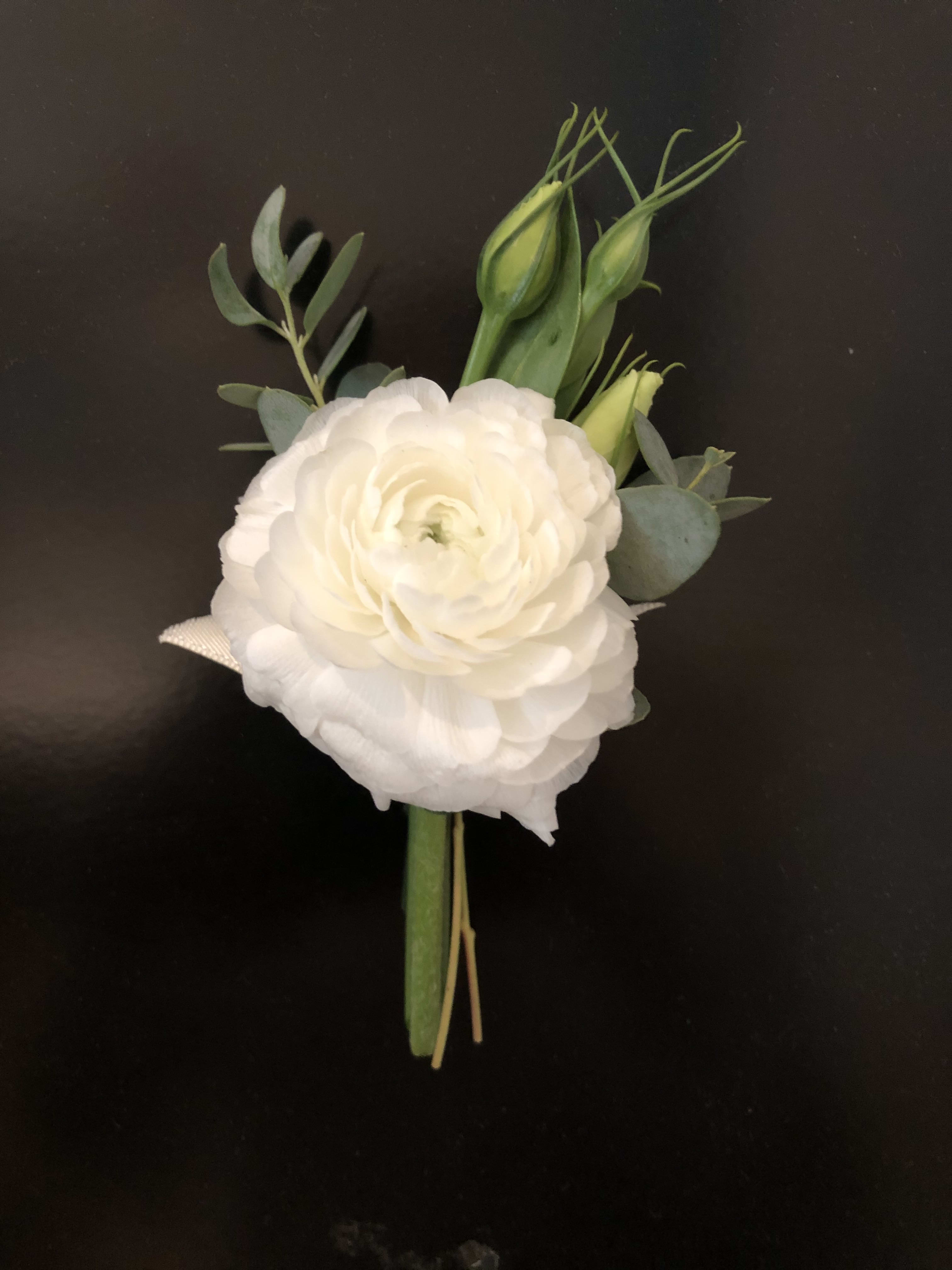 White Boutonniere - White spray rose boutonniere on a magnetic bout buddy. Pre-order is highly suggested as we may not have spray roses for day of orders. For specialty colors call for availability.