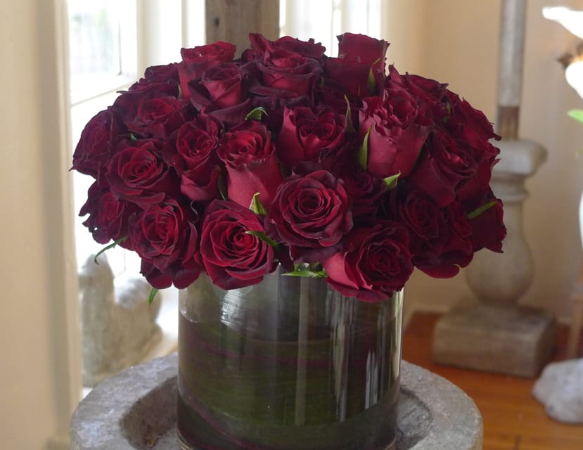 Magic Red - Black Magic Roses (as shown: Deluxe arrangement)