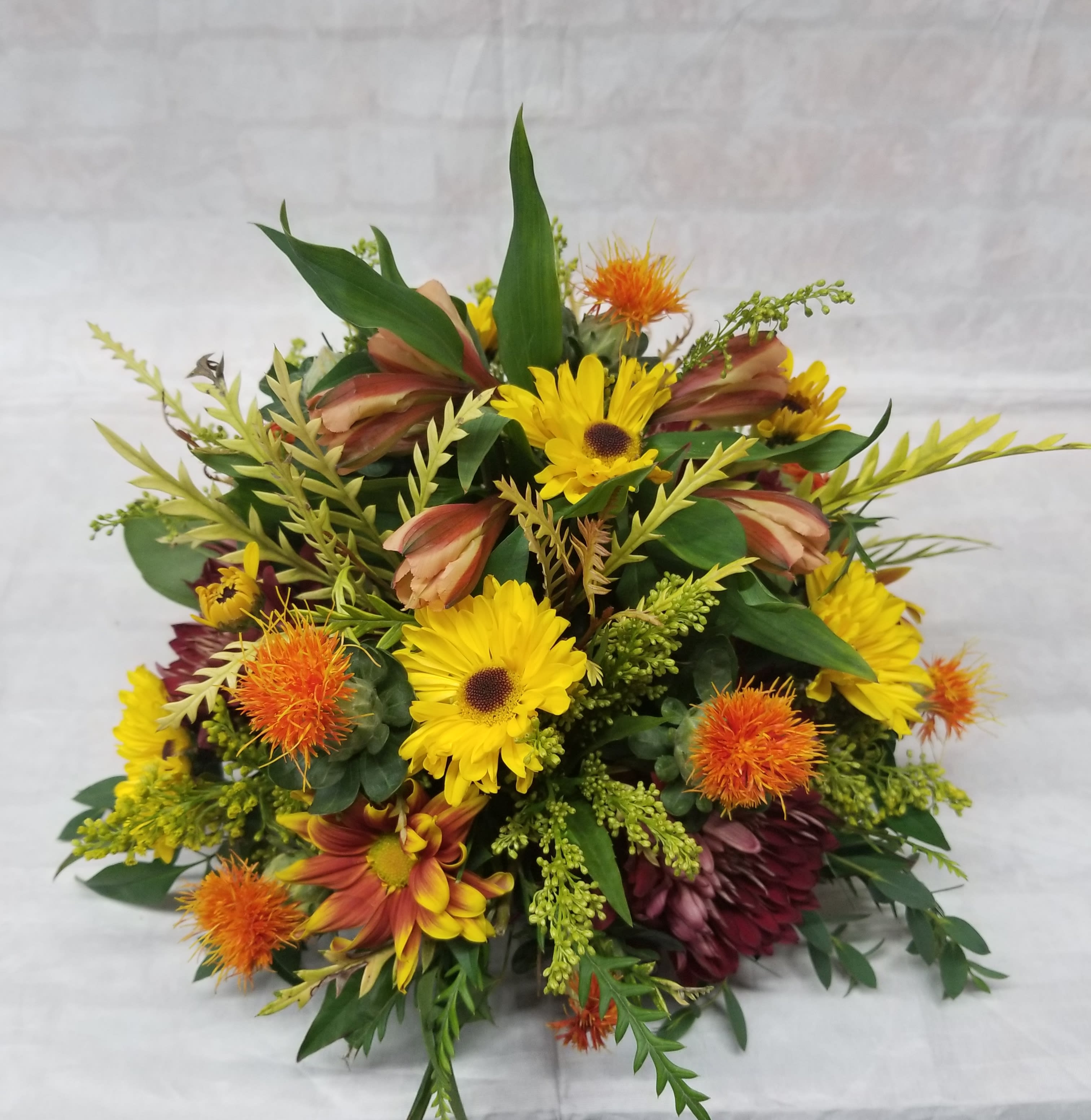 Autumn Dreams Centerpiece  - Choose this beautiful fall centerpiece that features a mix of chrysathemums and safflowers! 